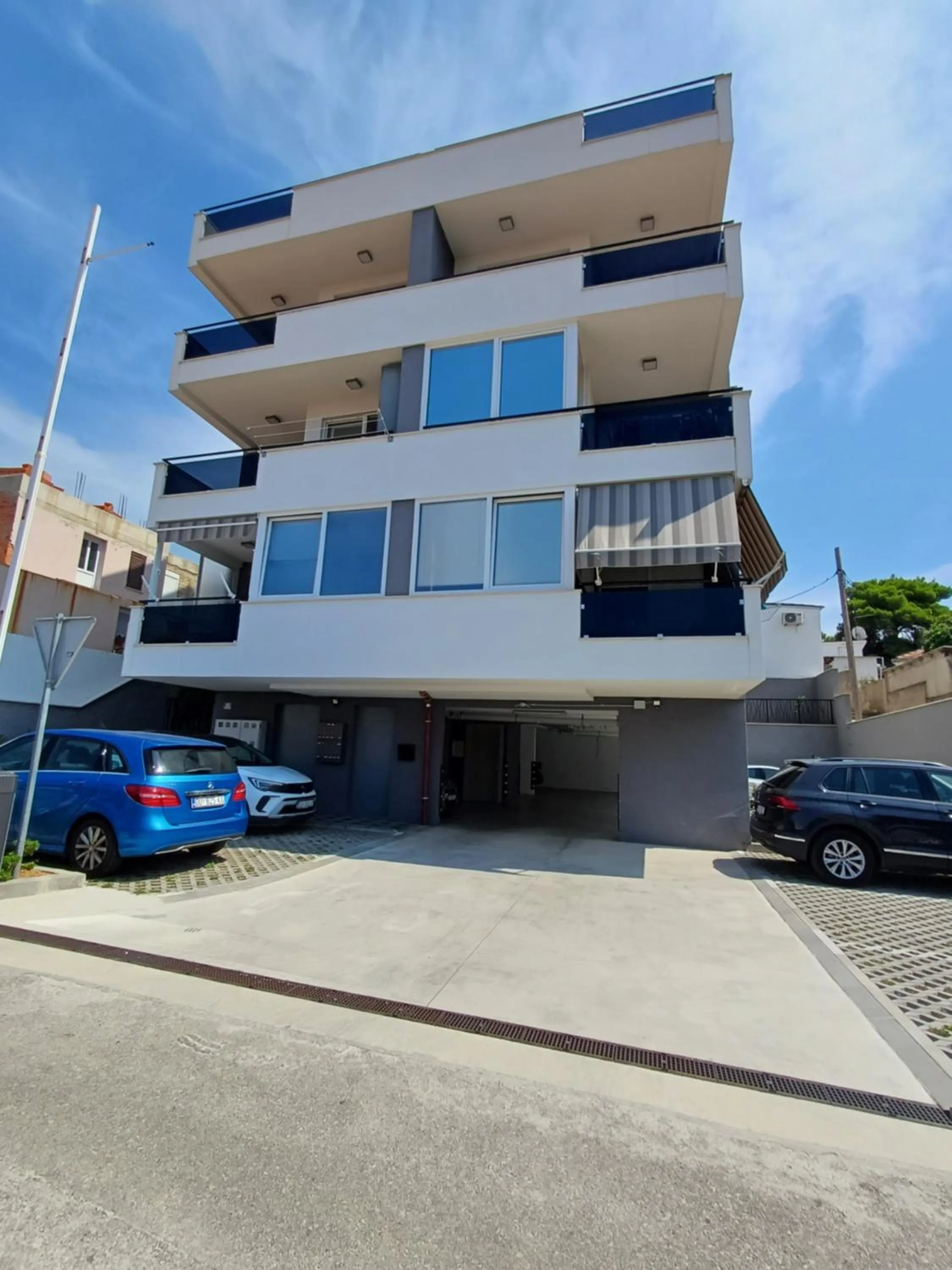 Property building in Apartments Mak & Lux - sea & sunset top view