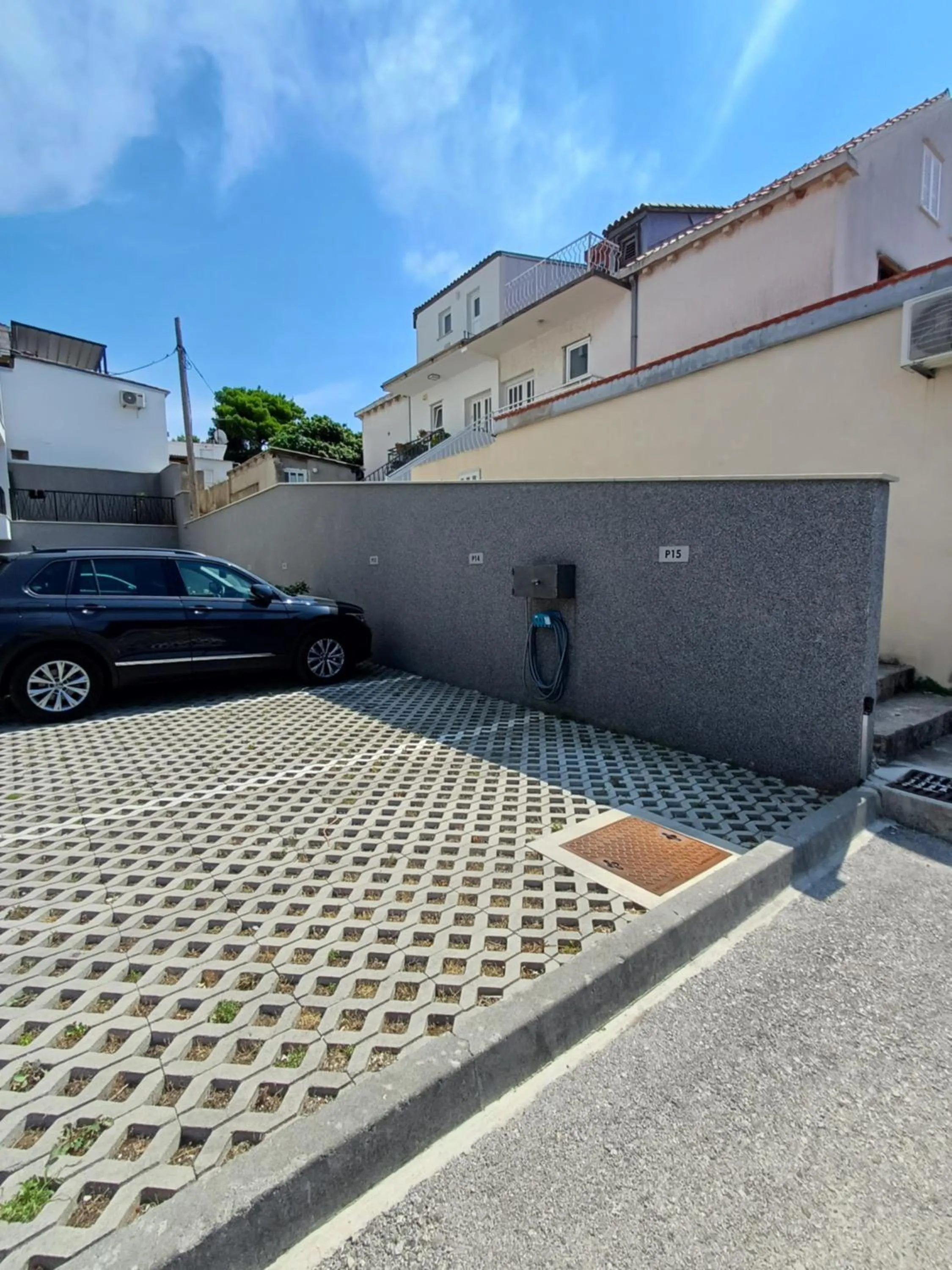 Parking in Apartments Mak & Lux - sea & sunset top view
