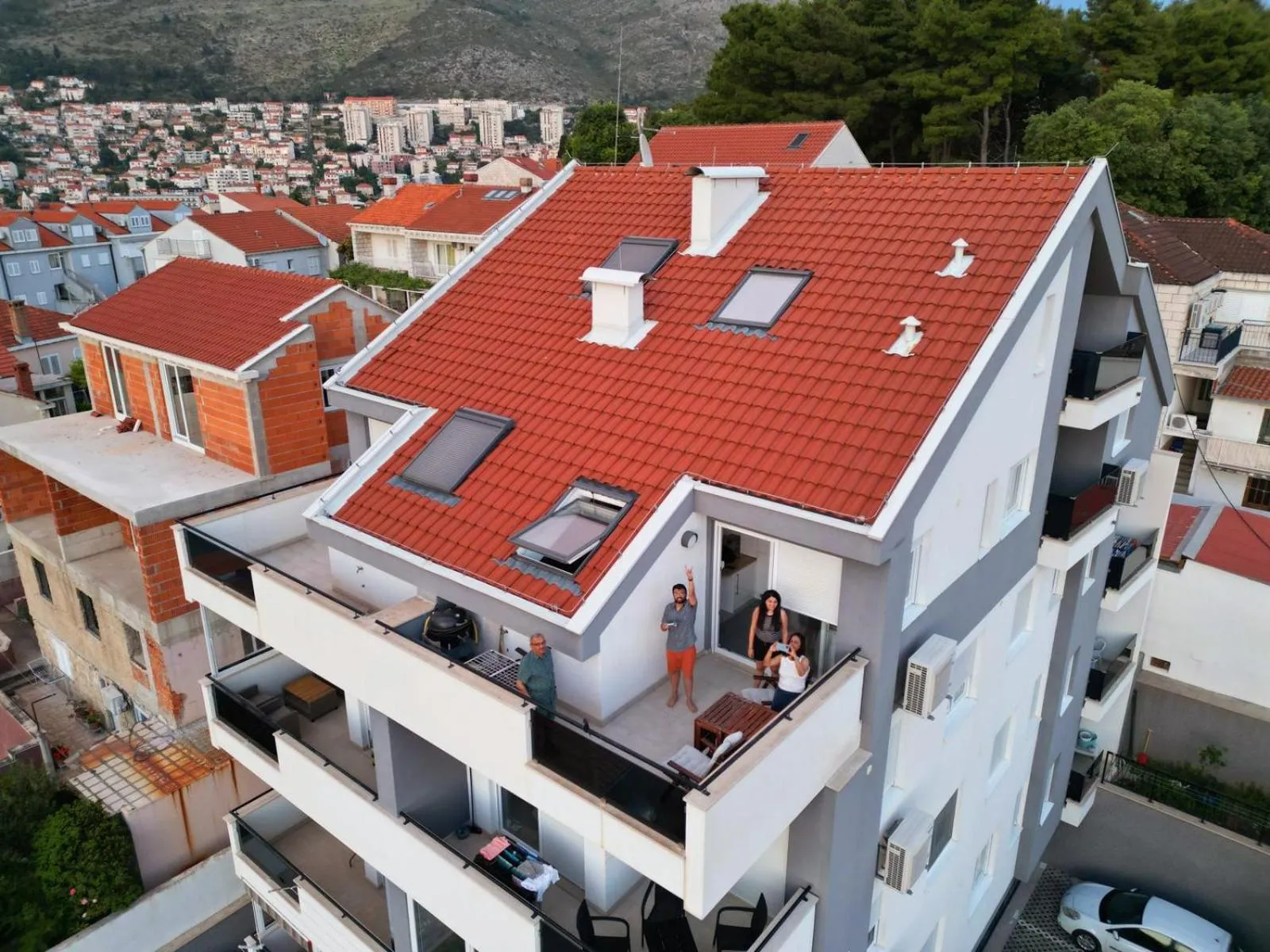Property building in Apartments Mak & Lux - sea & sunset top view