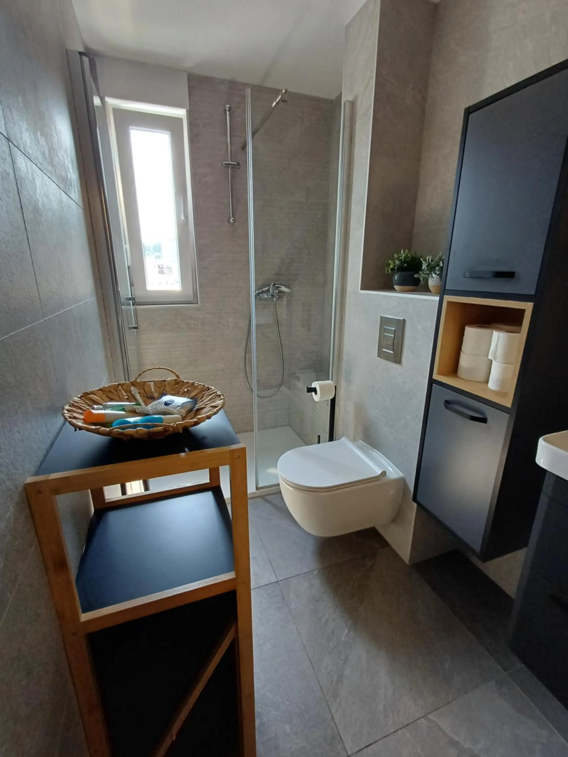 Shower in Apartments Mak & Lux - sea & sunset top view