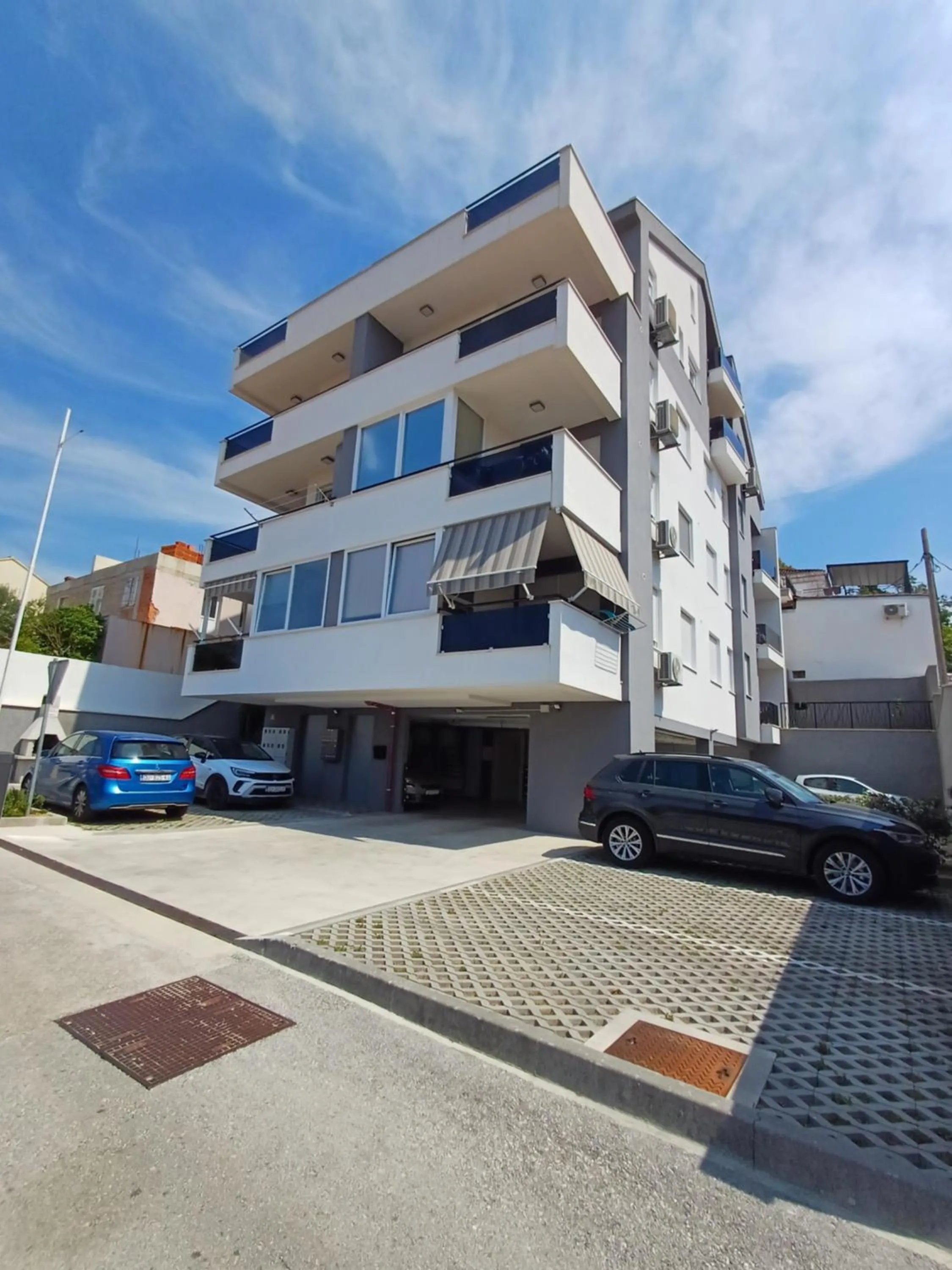 Property building in Apartments Mak & Lux - sea & sunset top view