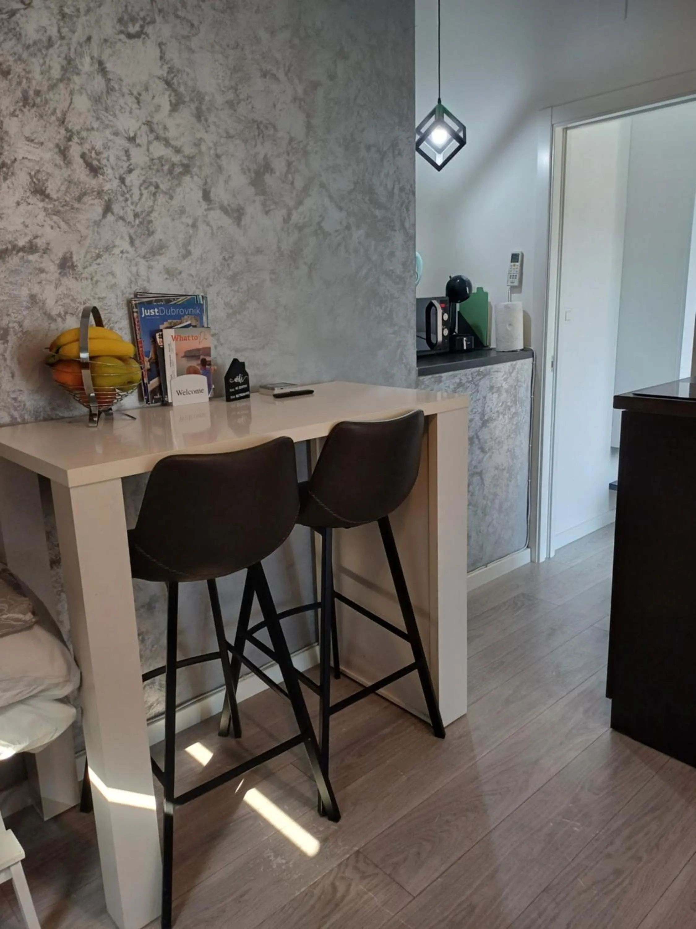 Dining area in Apartments Mak & Lux - sea & sunset top view