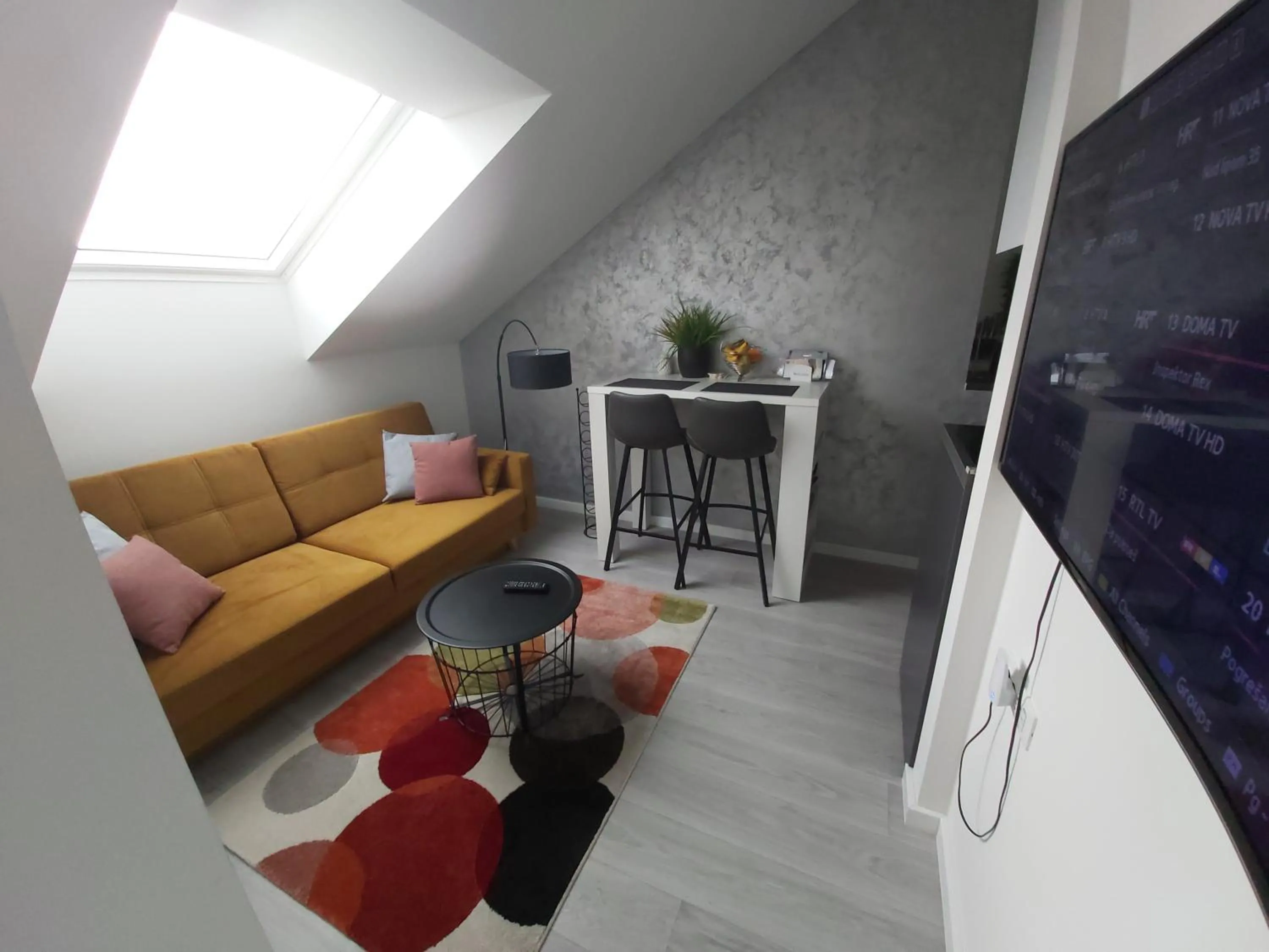 Living room in Apartments Mak & Lux - sea & sunset top view