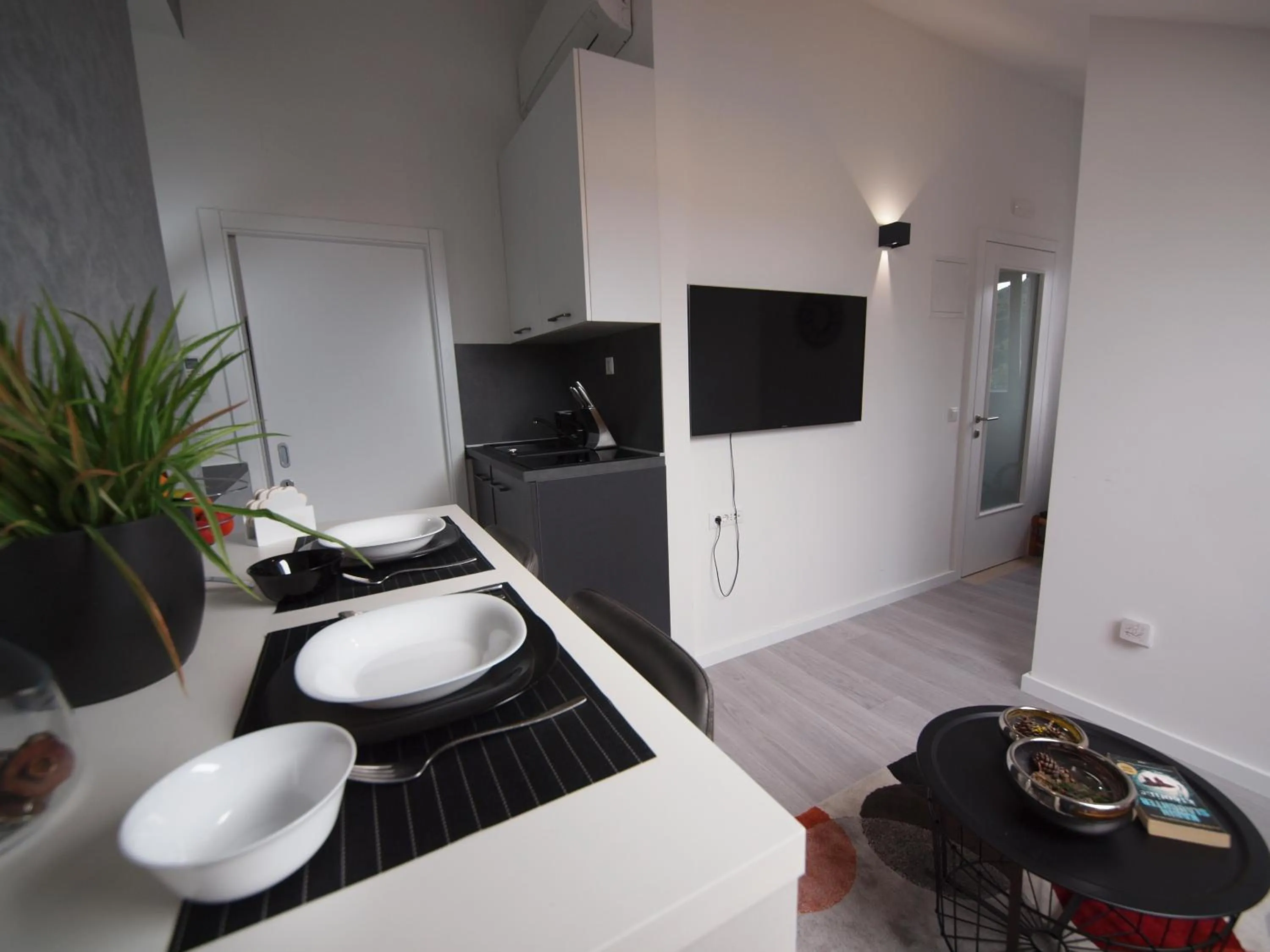 Dining area in Apartments Mak & Lux - sea & sunset top view