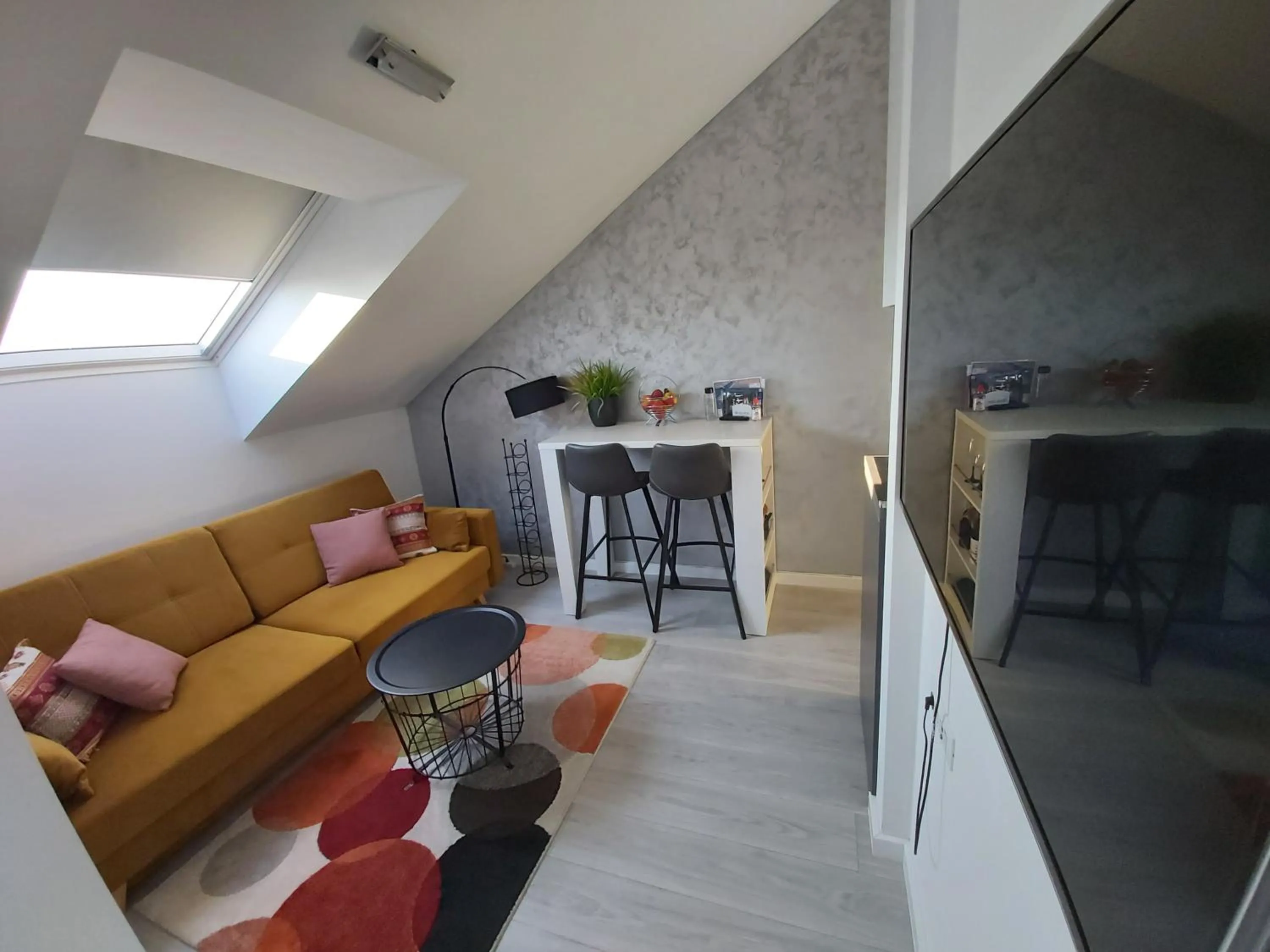 Living room in Apartments Mak & Lux - sea & sunset top view