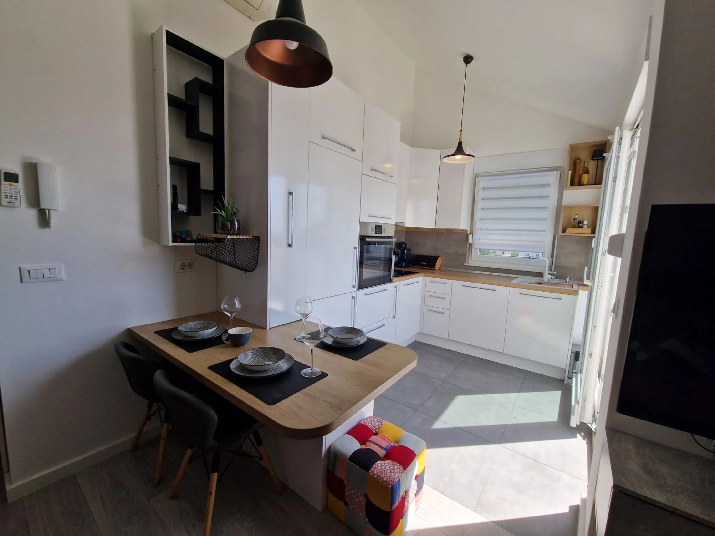 Kitchen or kitchenette in Apartments Mak & Lux - sea & sunset top view