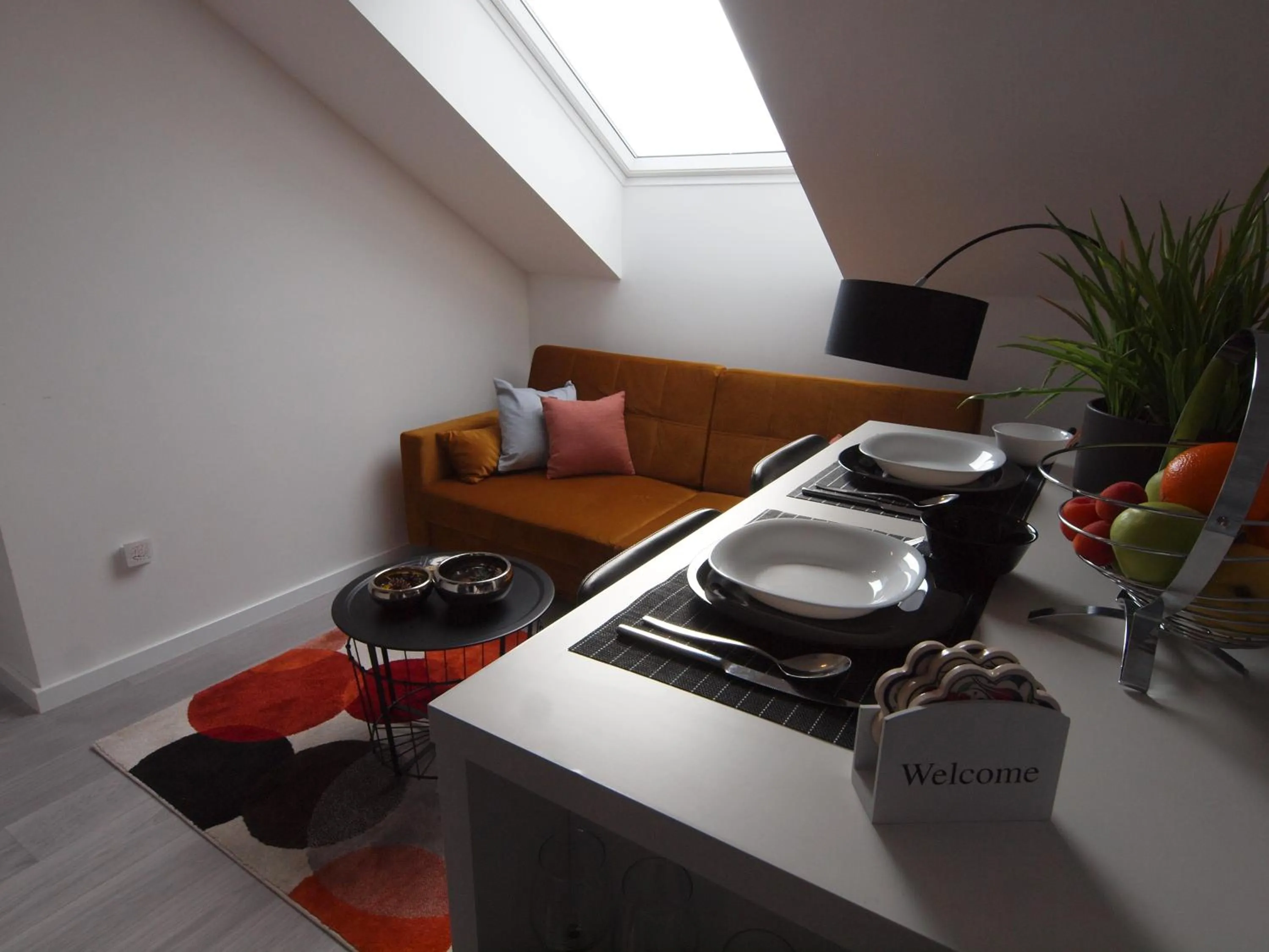Dining area in Apartments Mak & Lux - sea & sunset top view