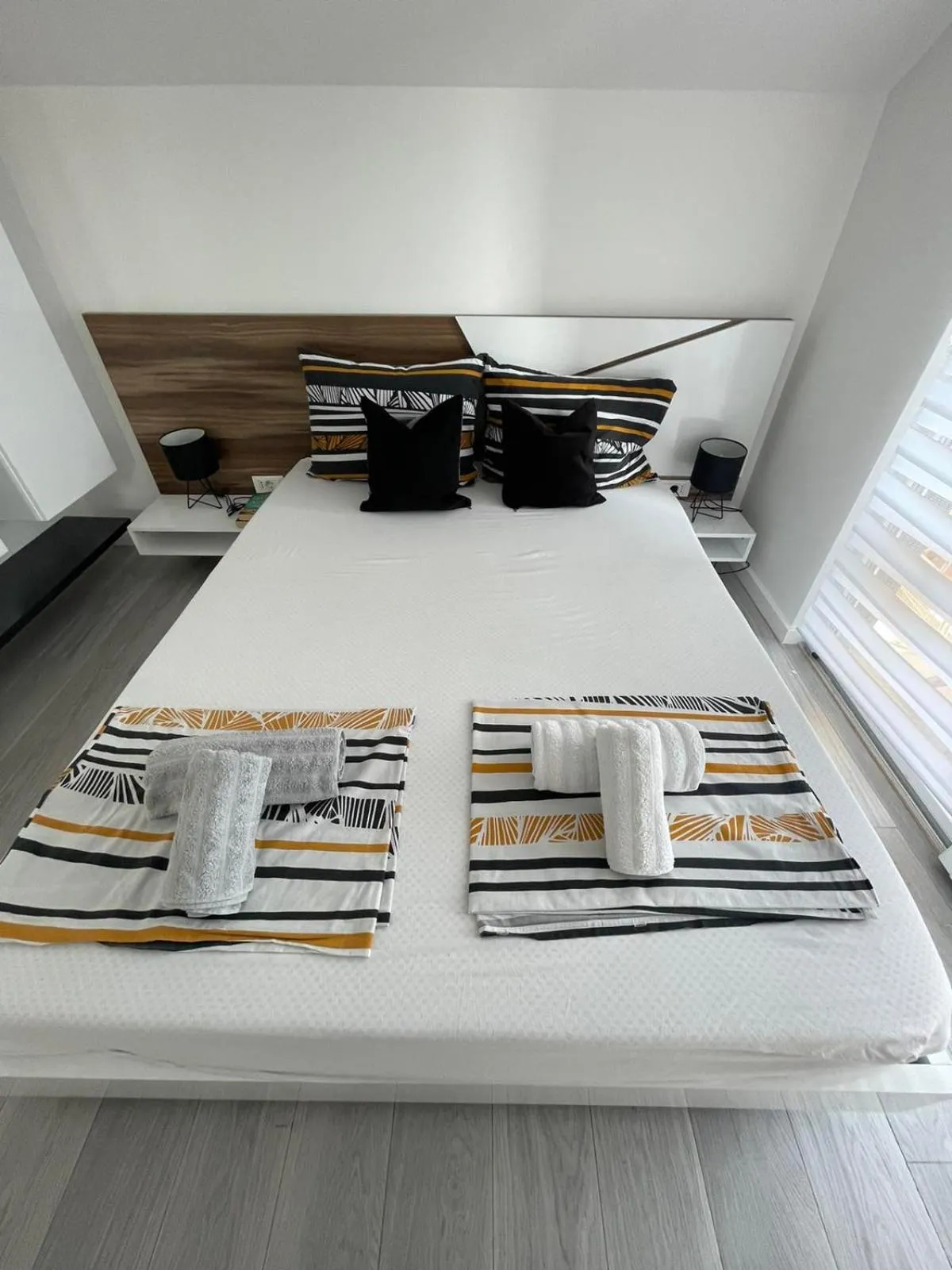 Bed in Apartments Mak & Lux - sea & sunset top view
