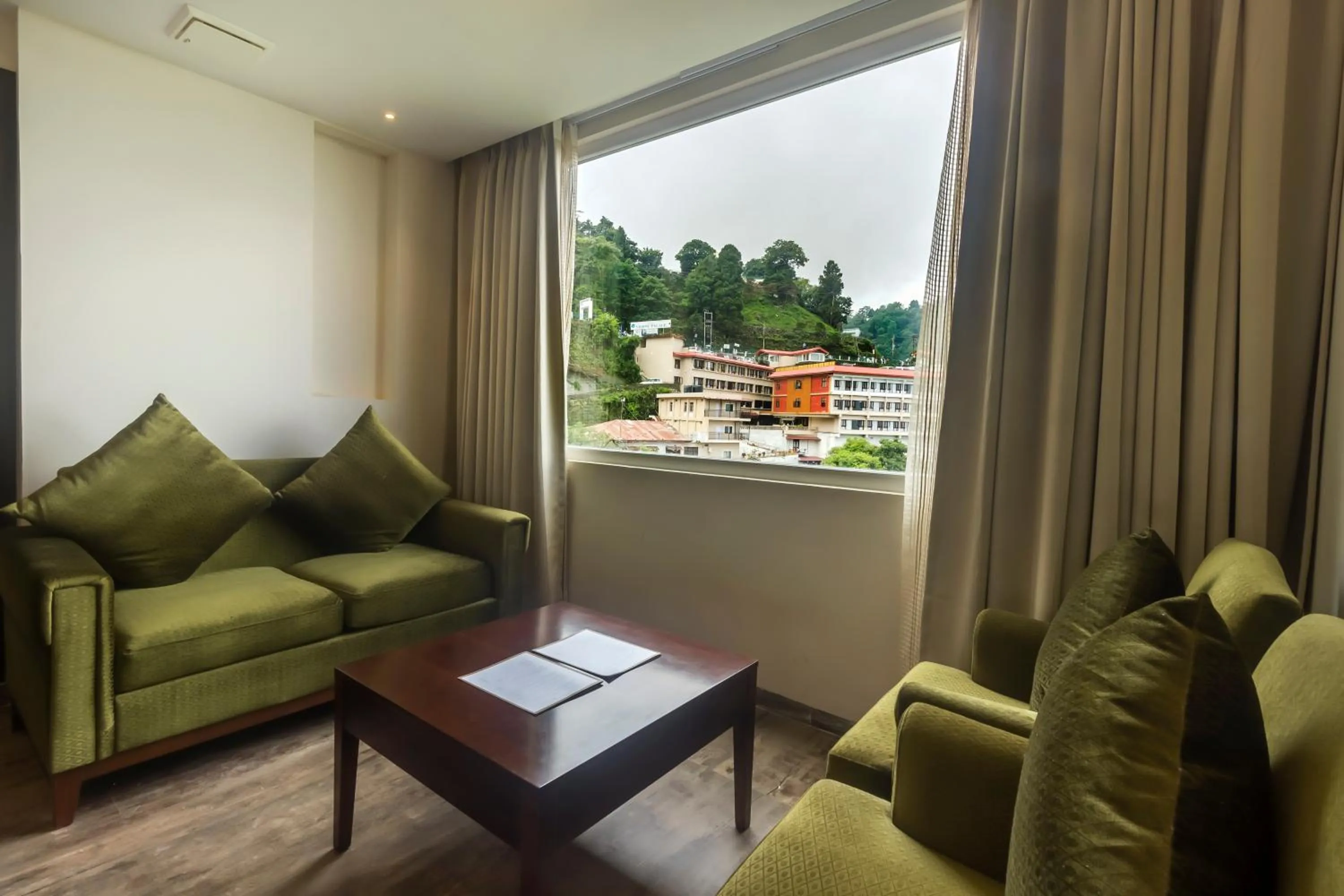 Seating area in EllBee Mussoorie Hills