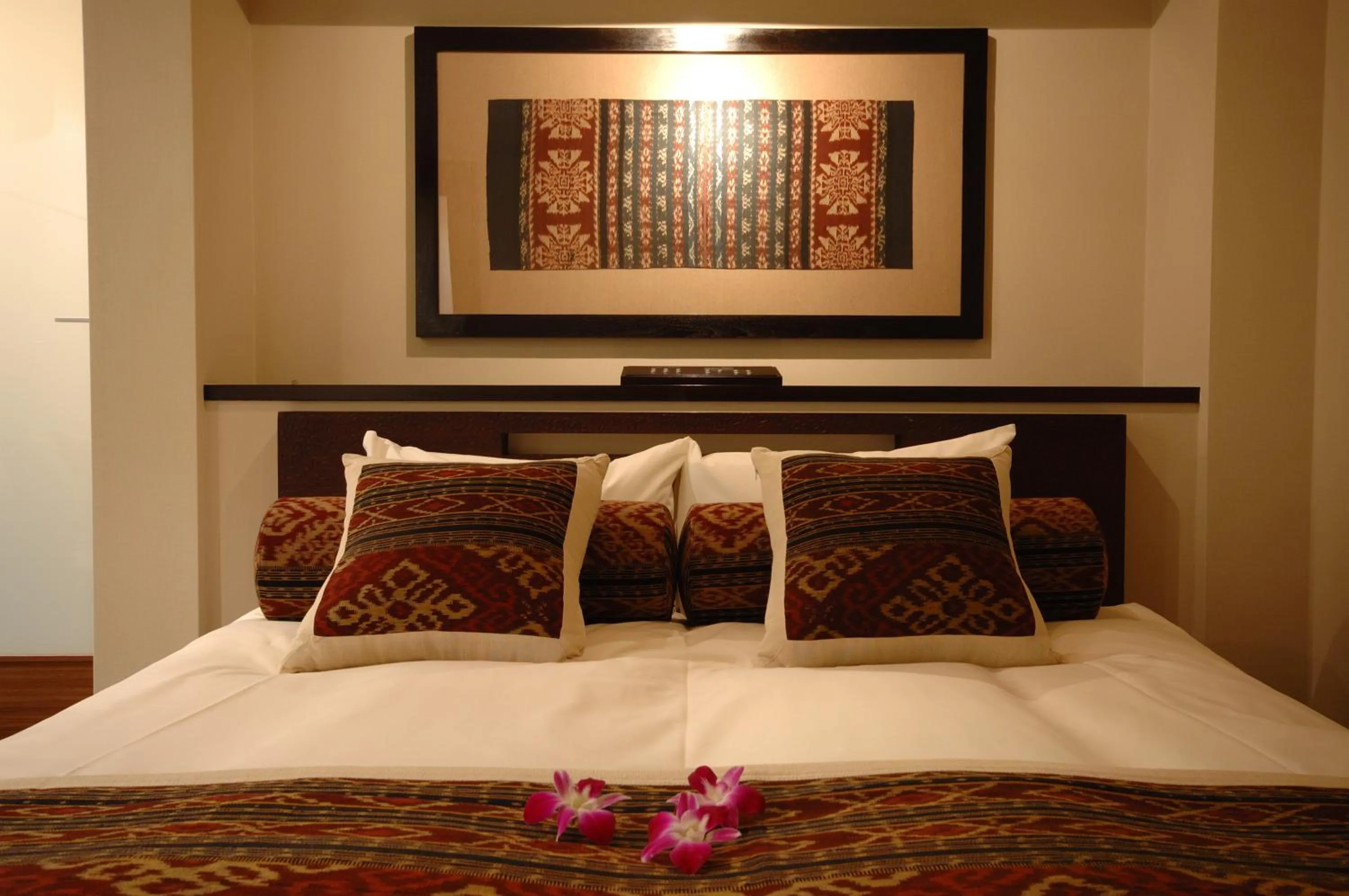 Bedroom in AROMA BARU (Adult Only)