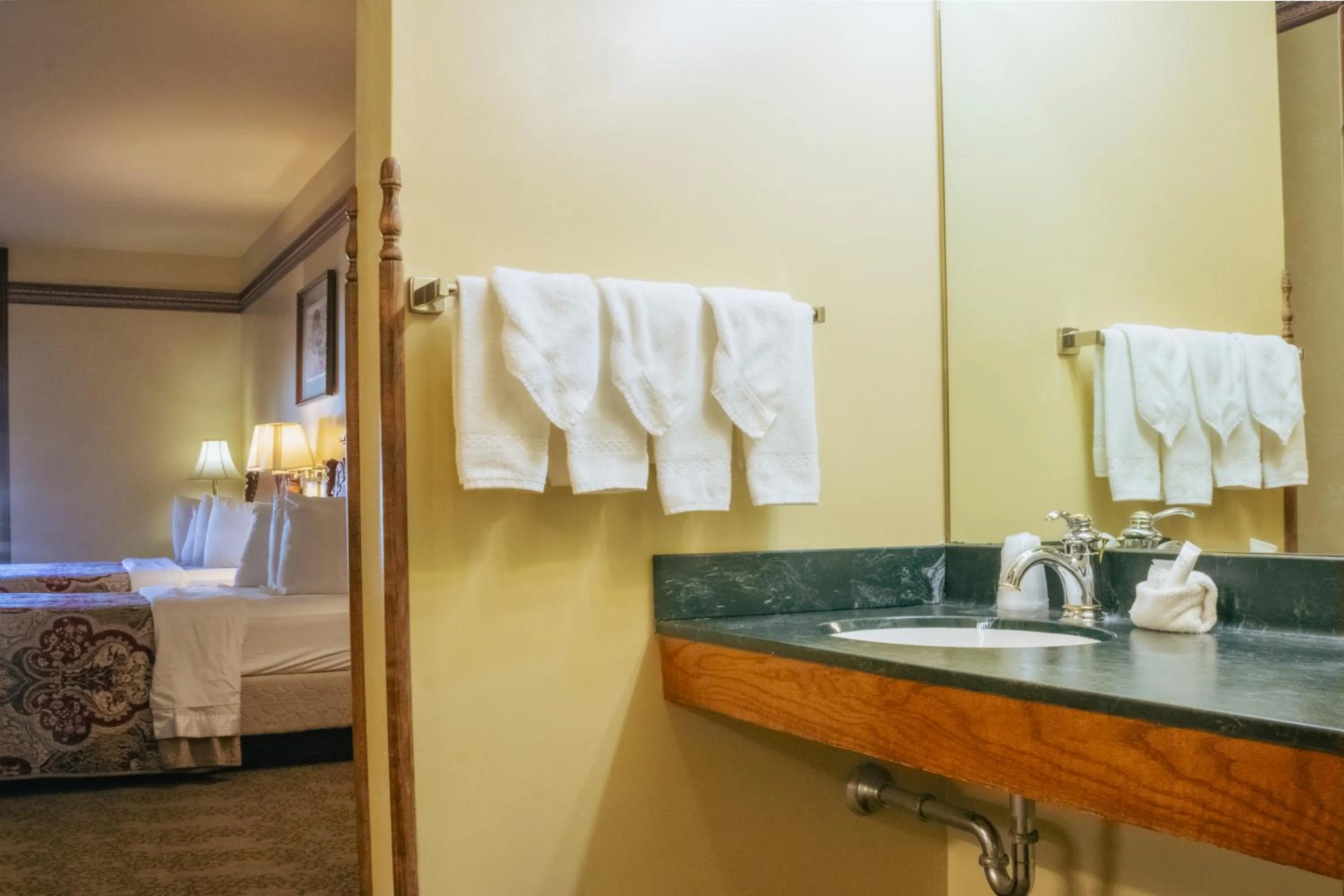 Bed in Historic Bullock Hotel