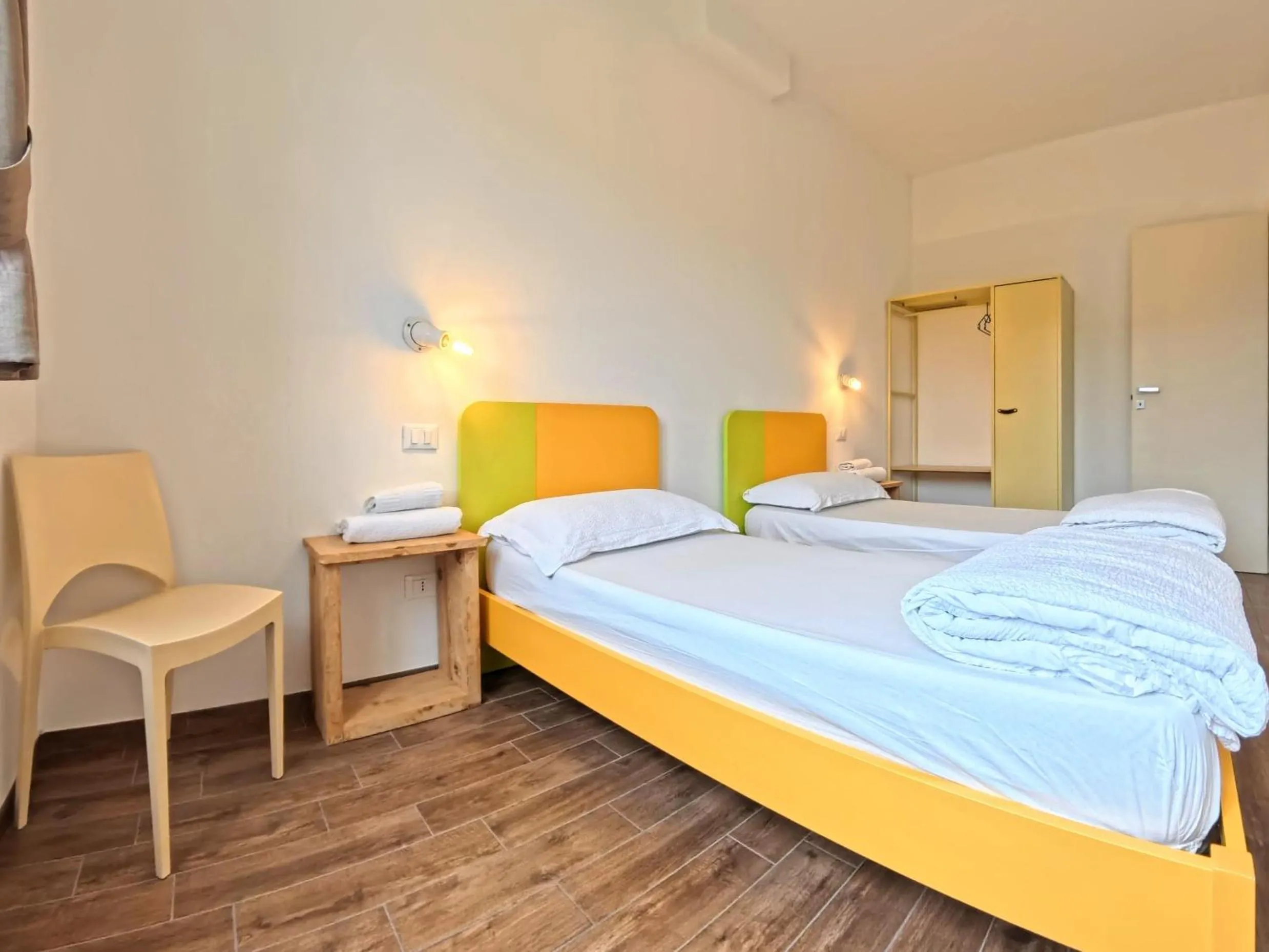 Bed in Oasi Da Vinci Apartments Lake Garda View