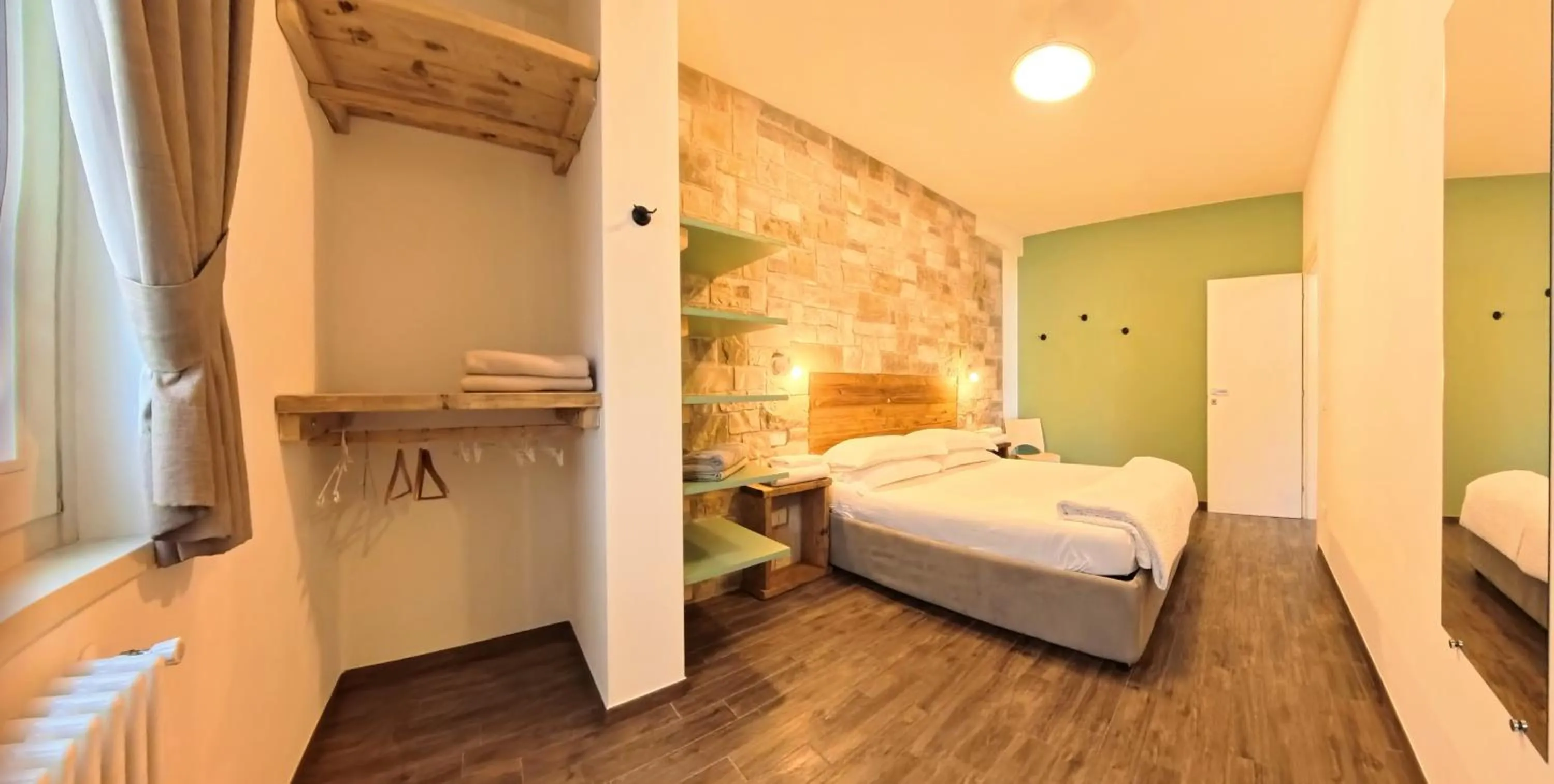 Bed in Oasi Da Vinci Apartments Lake Garda View