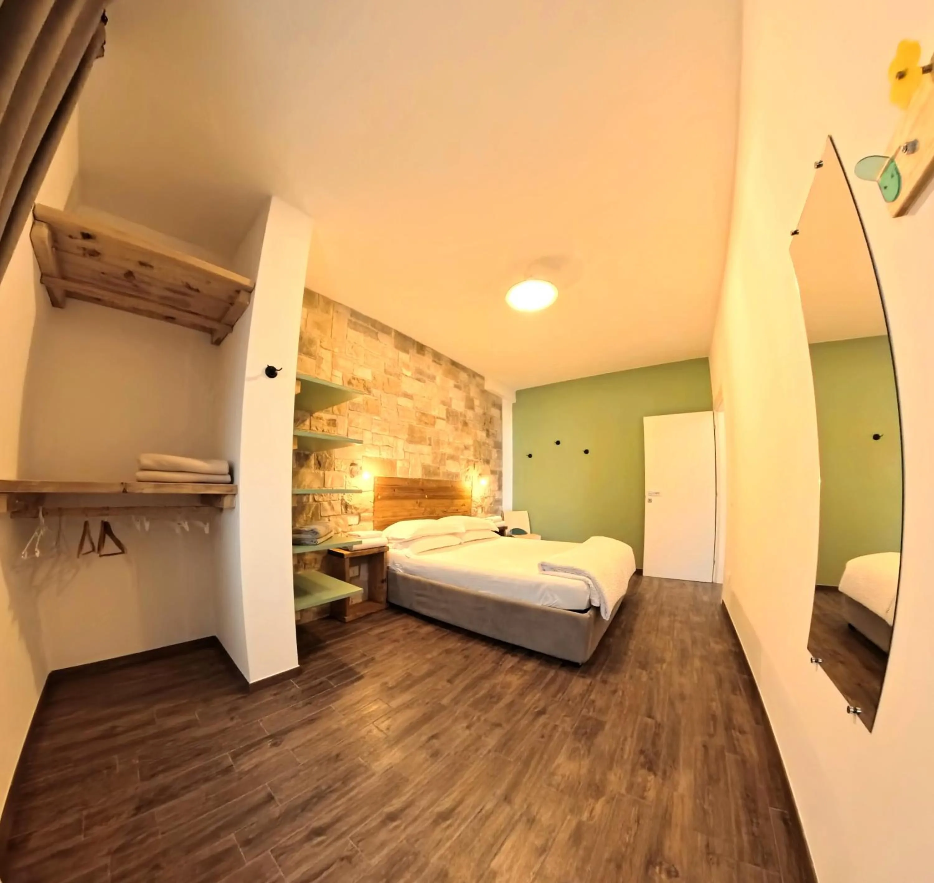 Bed in Oasi Da Vinci Apartments Lake Garda View