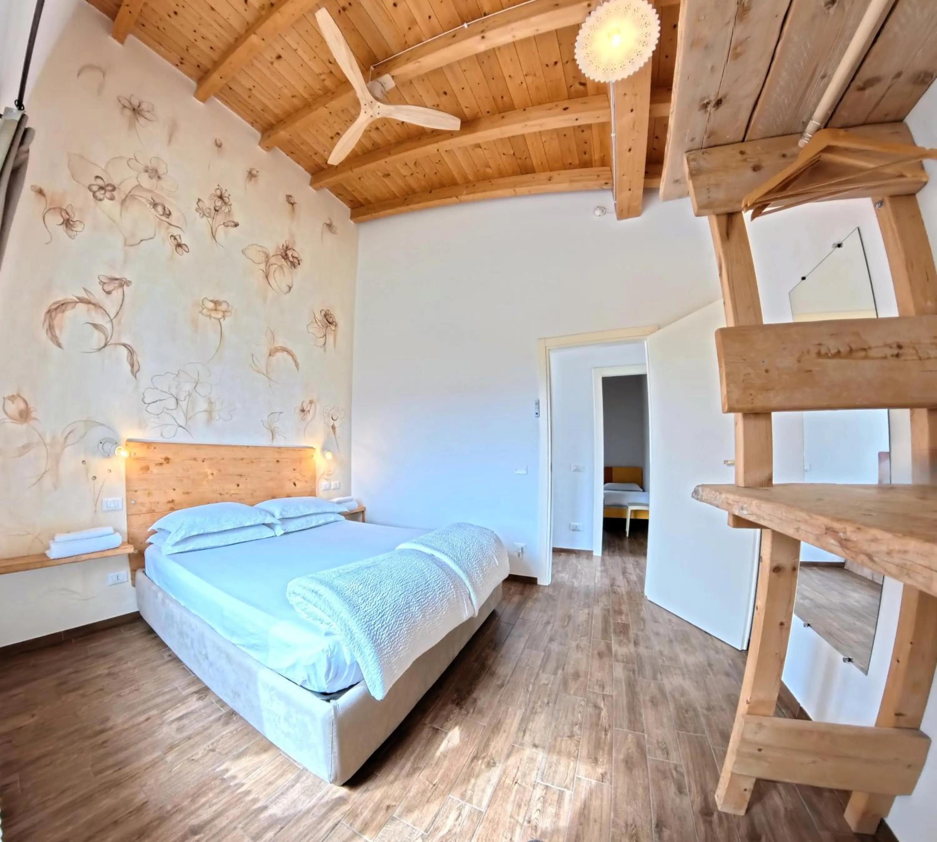 Bed in Oasi Da Vinci Apartments Lake Garda View