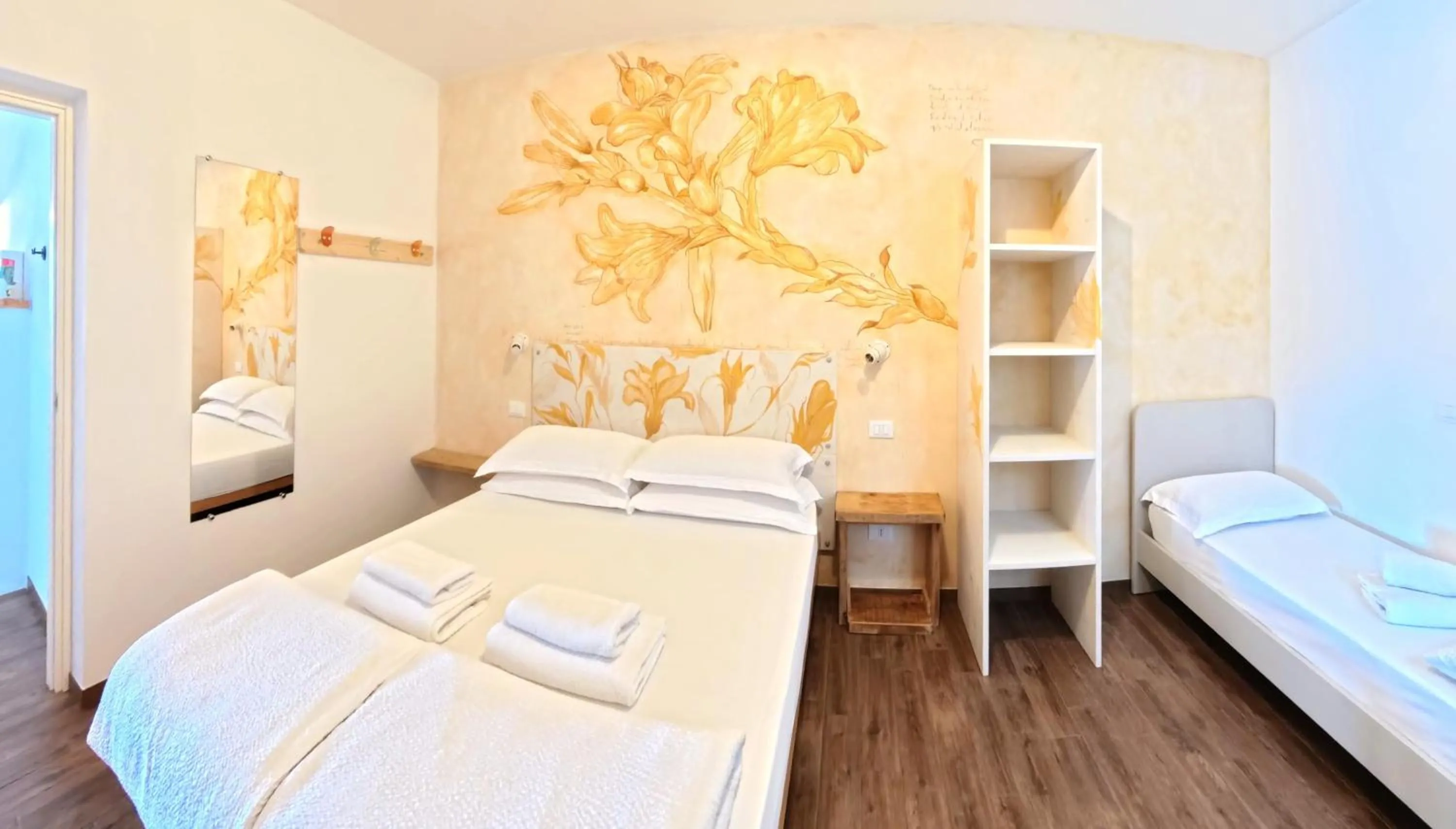 Bed in Oasi Da Vinci Apartments Lake Garda View