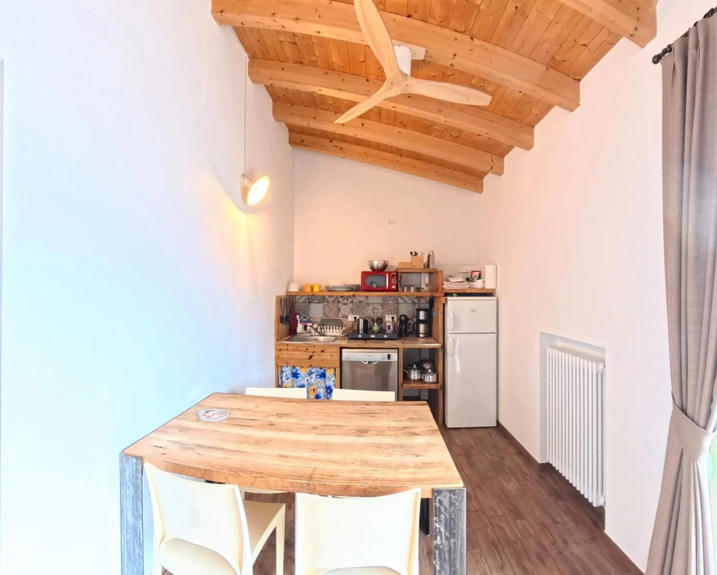 Kitchen or kitchenette in Oasi Da Vinci Apartments Lake Garda View