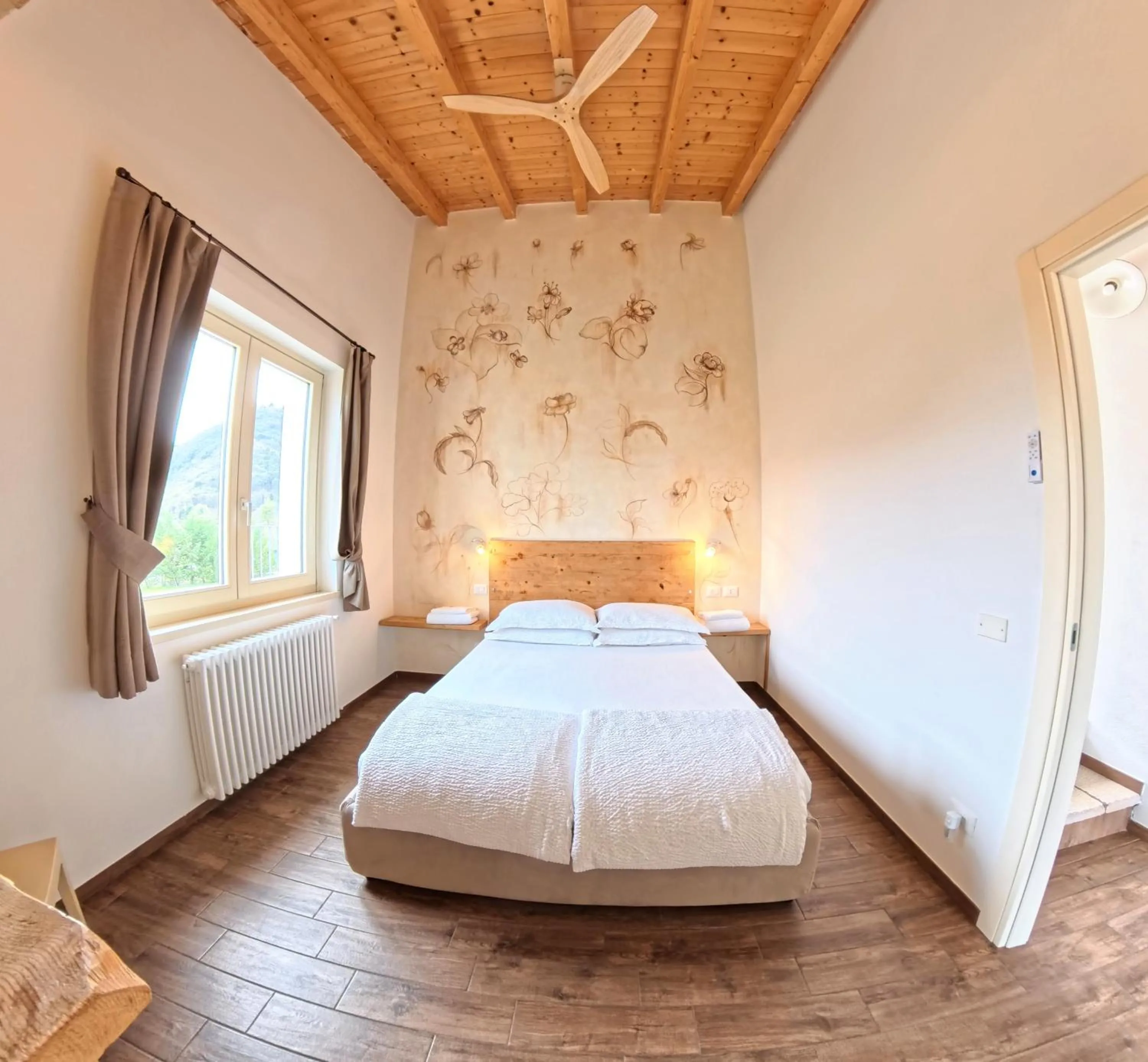 Bed in Oasi Da Vinci Apartments Lake Garda View