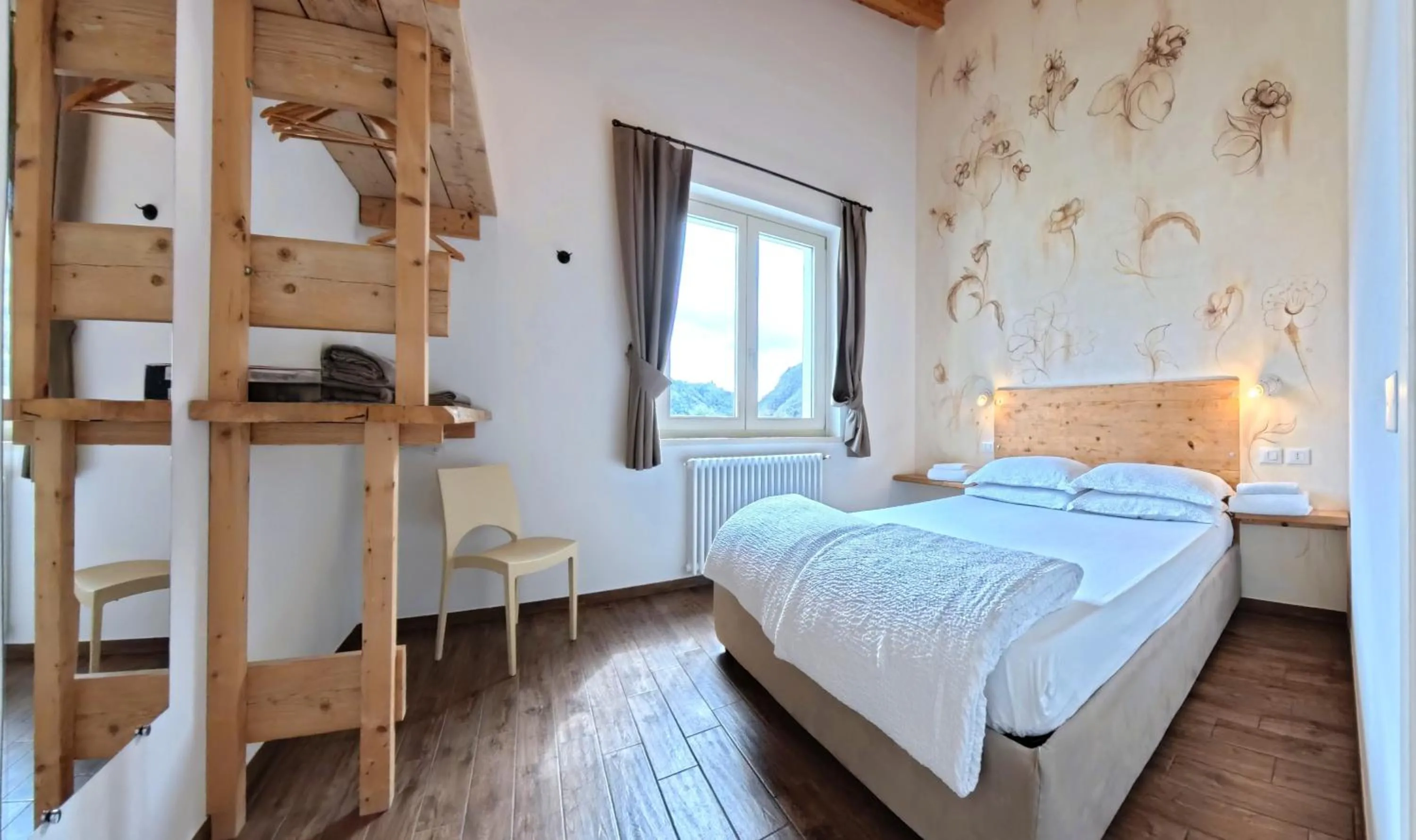 Bed in Oasi Da Vinci Apartments Lake Garda View