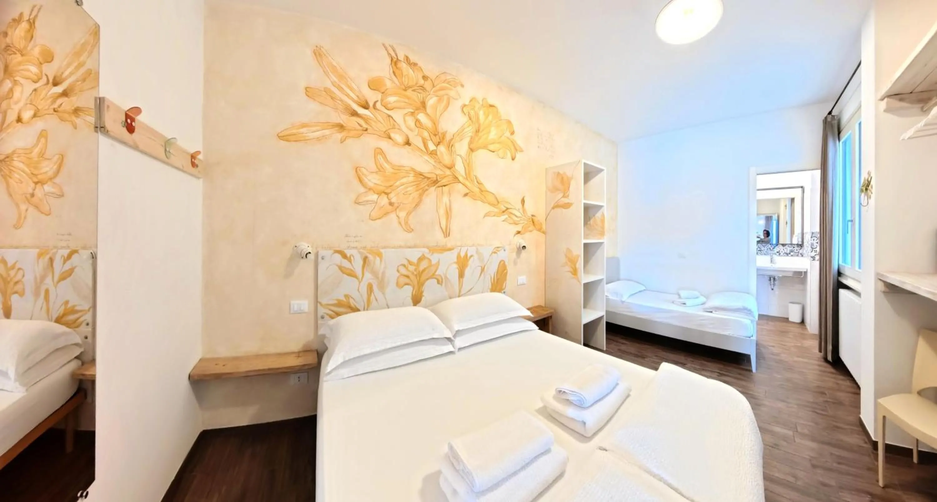 Bed in Oasi Da Vinci Apartments Lake Garda View