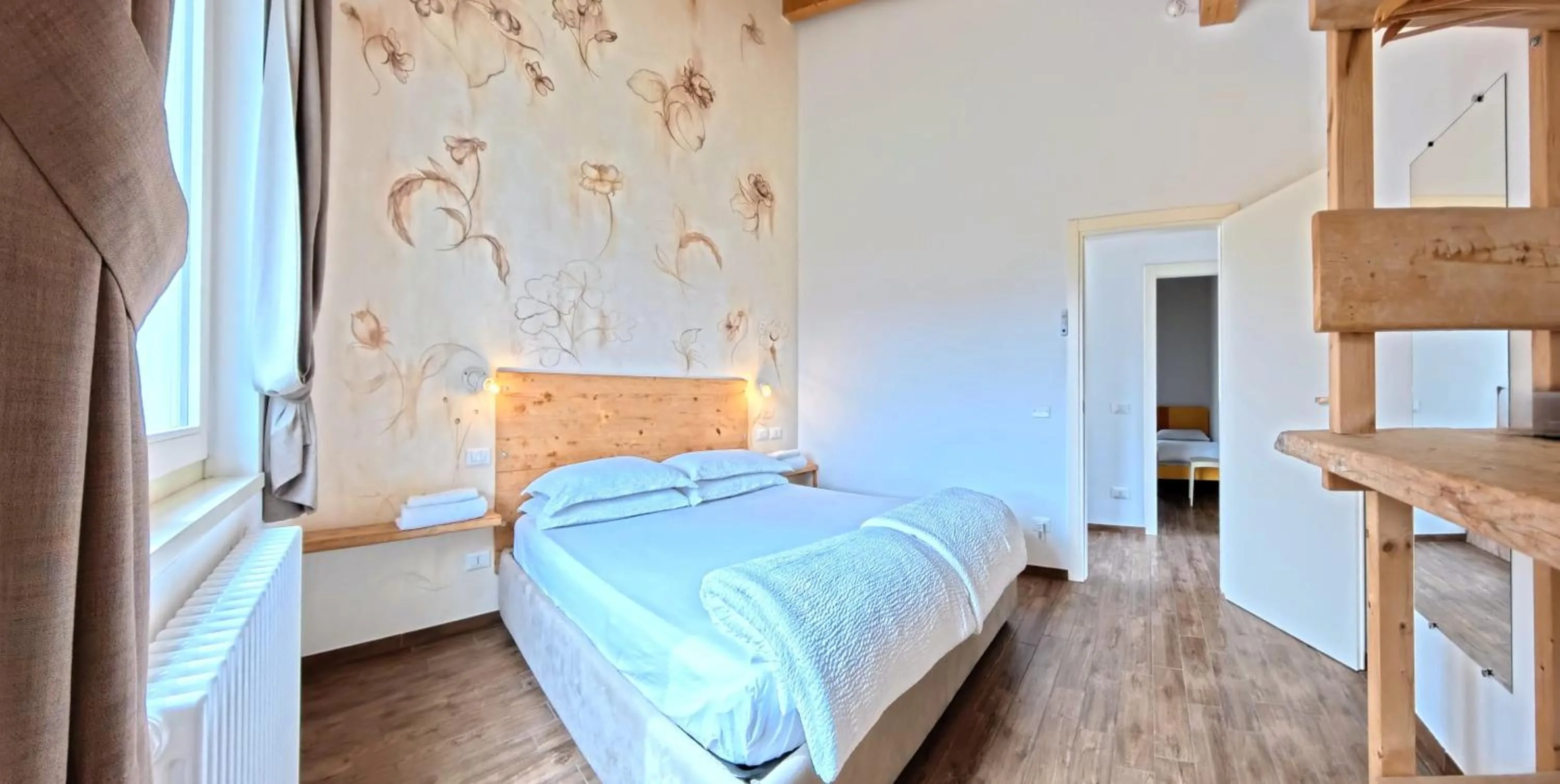 Bed in Oasi Da Vinci Apartments Lake Garda View