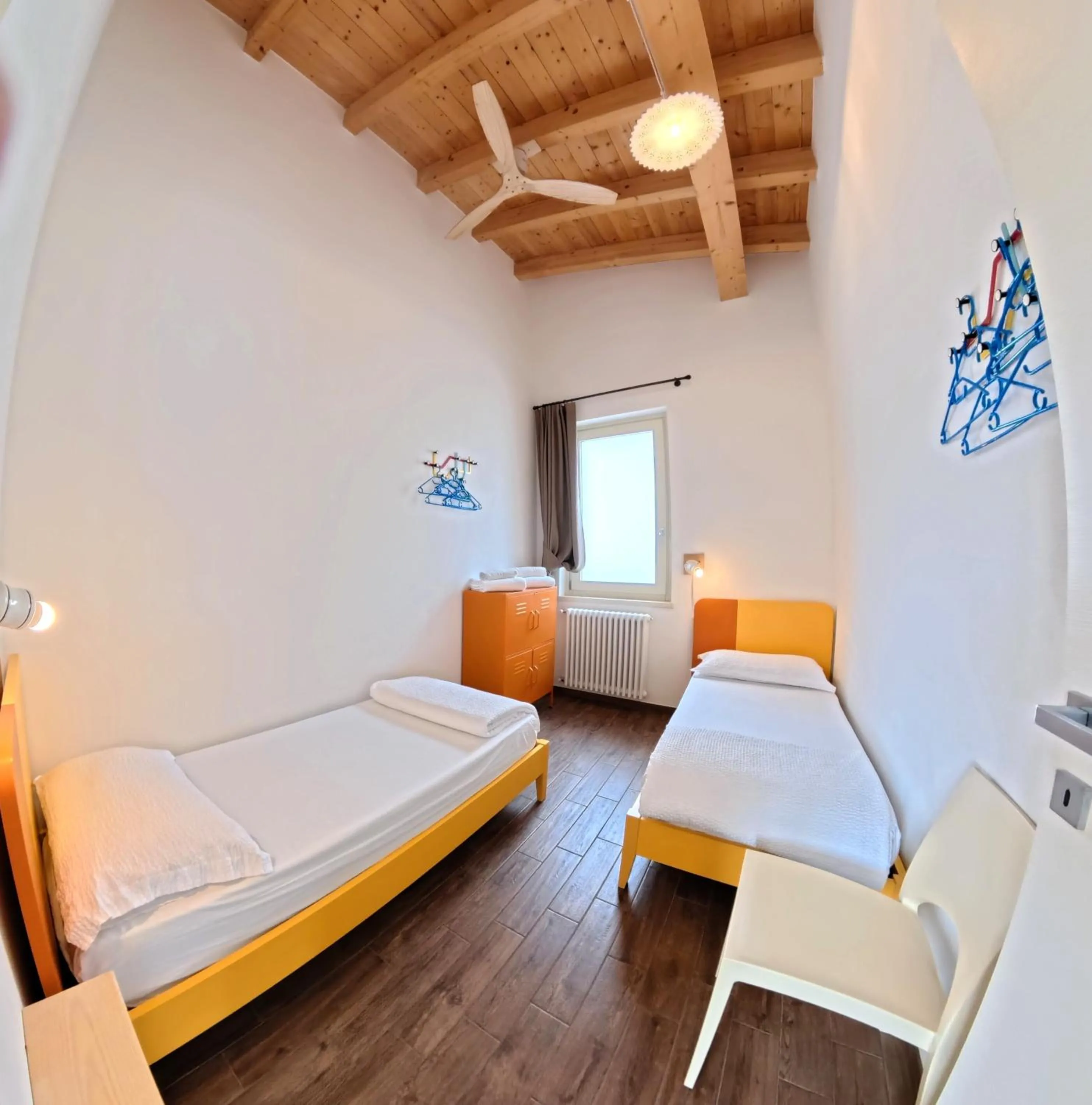 Bed in Oasi Da Vinci Apartments Lake Garda View