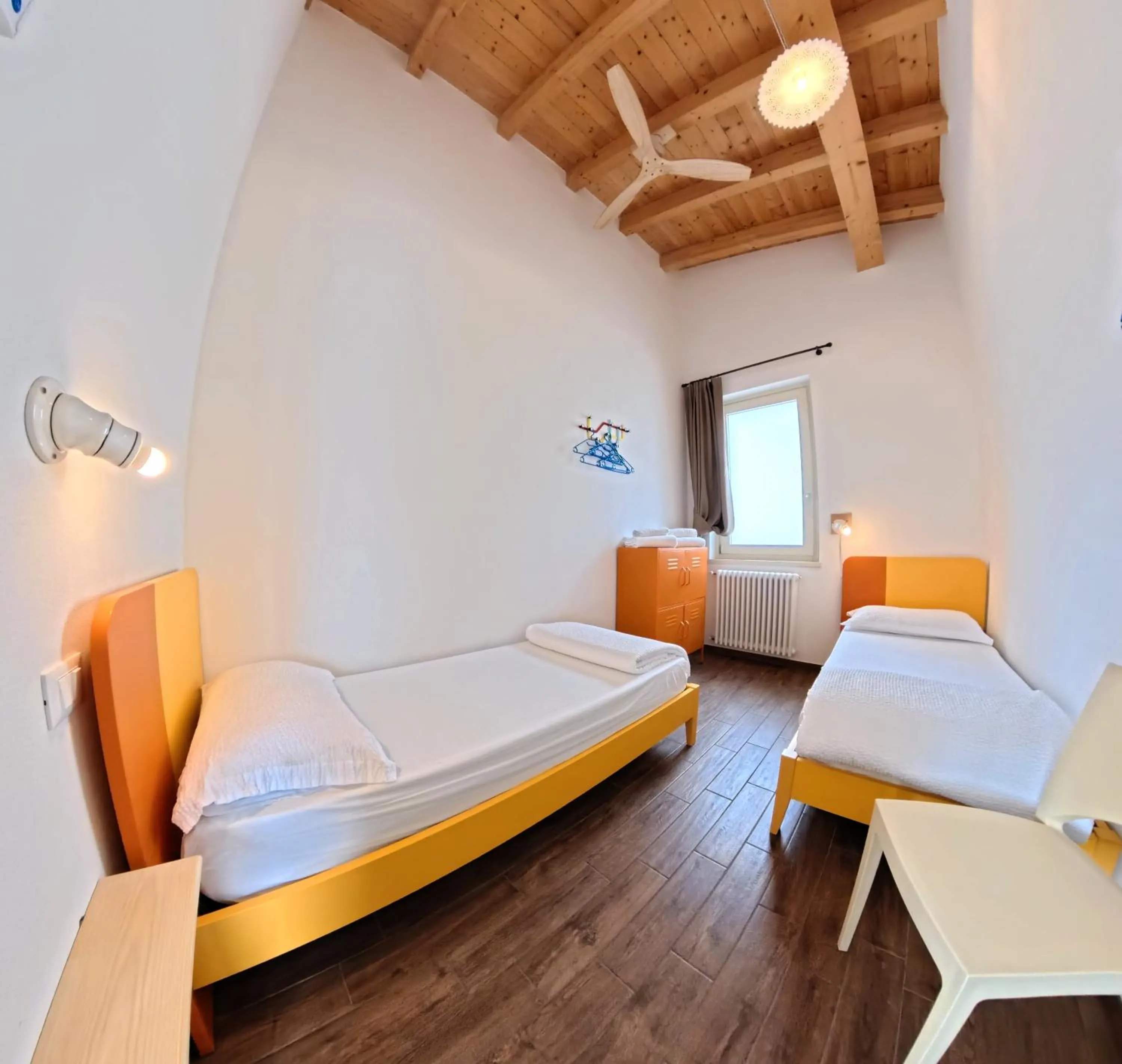 Bed in Oasi Da Vinci Apartments Lake Garda View