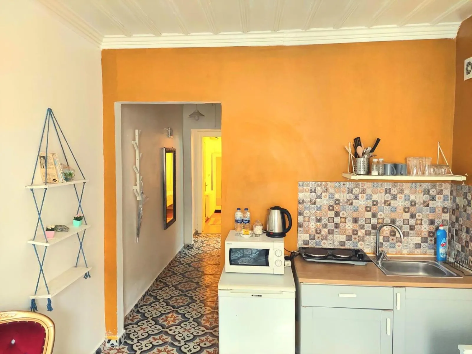 Kitchen or kitchenette in La bella hotel
