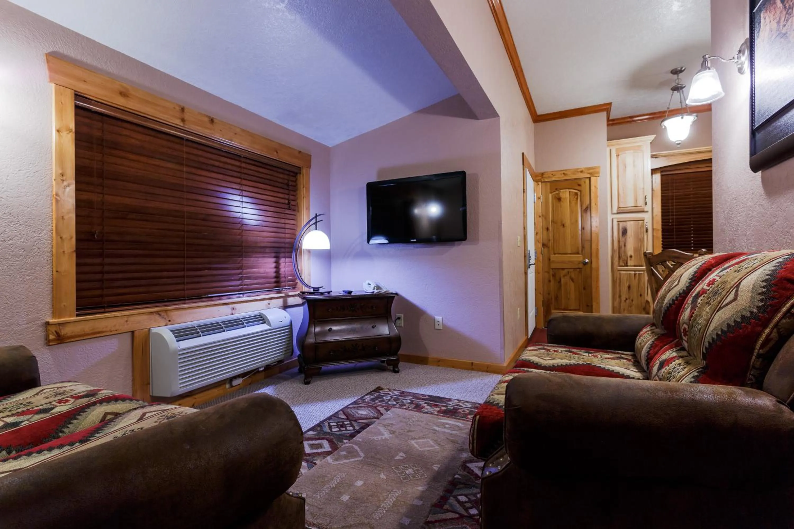 Living room, Bed in Desert Rose Resort & Cabins