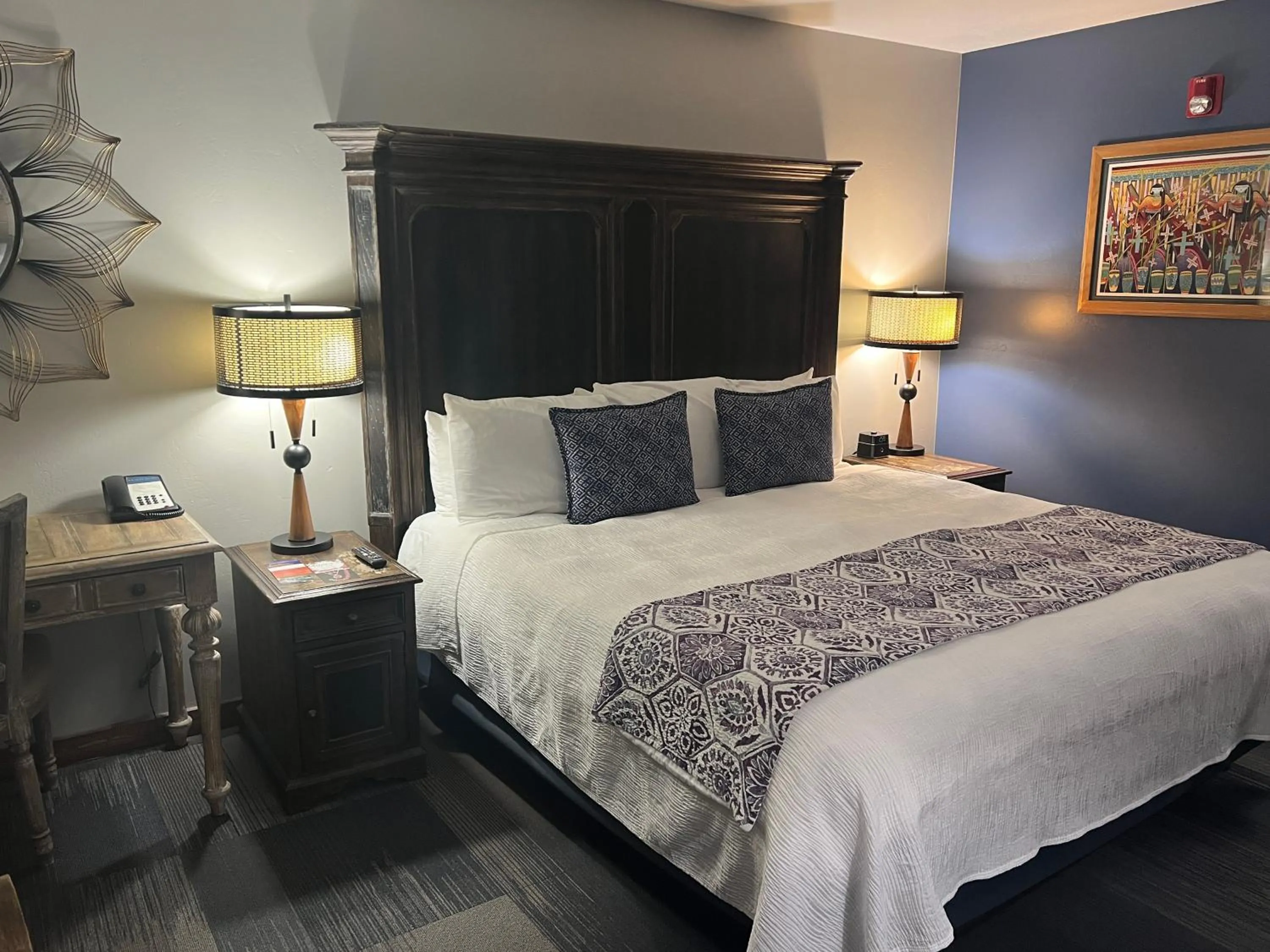 Bed in Desert Rose Resort & Cabins