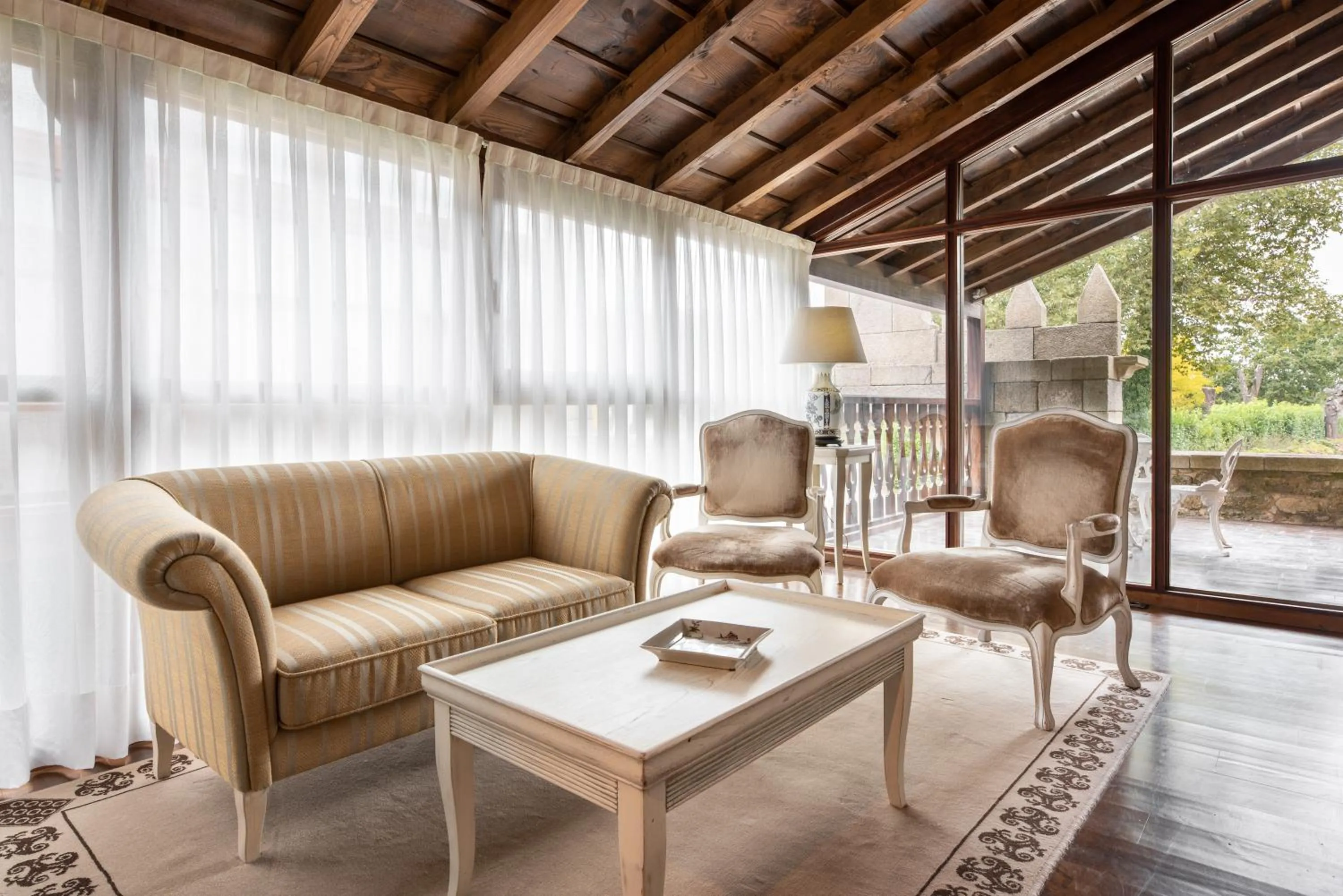 Living room in Áurea Palacio de Sober by Eurostars Hotel Company