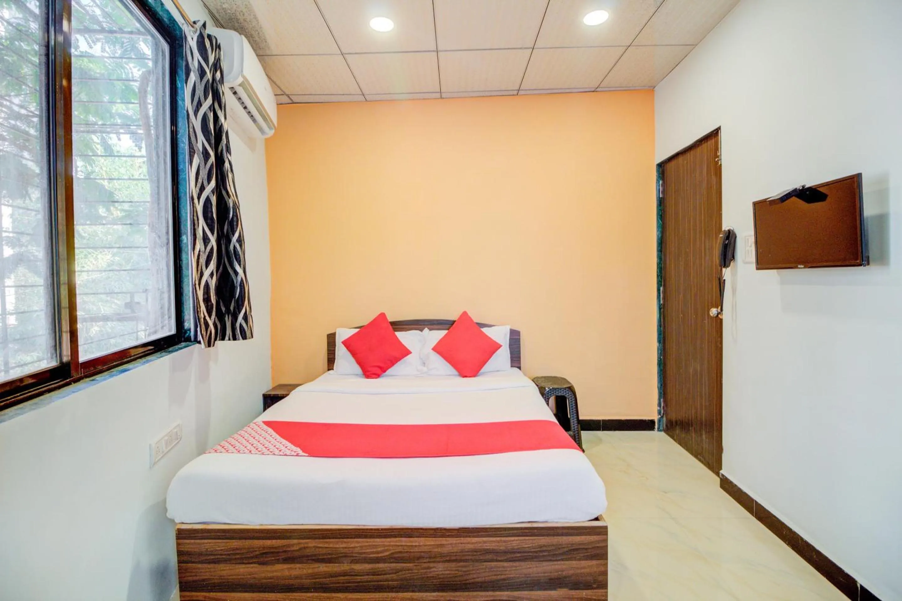 Bedroom, Bed in Super Hotel O Anjali Hotel