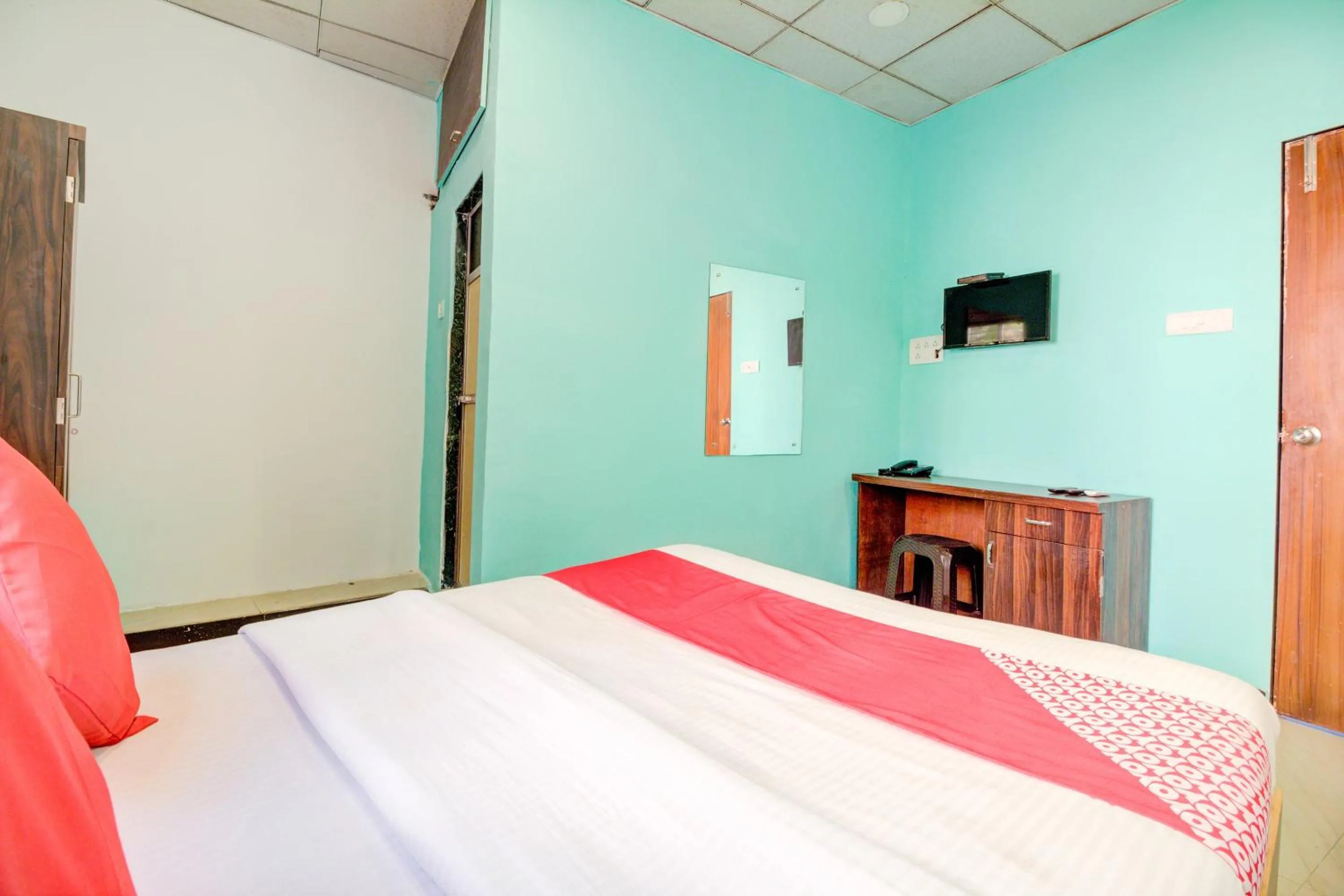 Bedroom, Bed in Super Hotel O Anjali Hotel