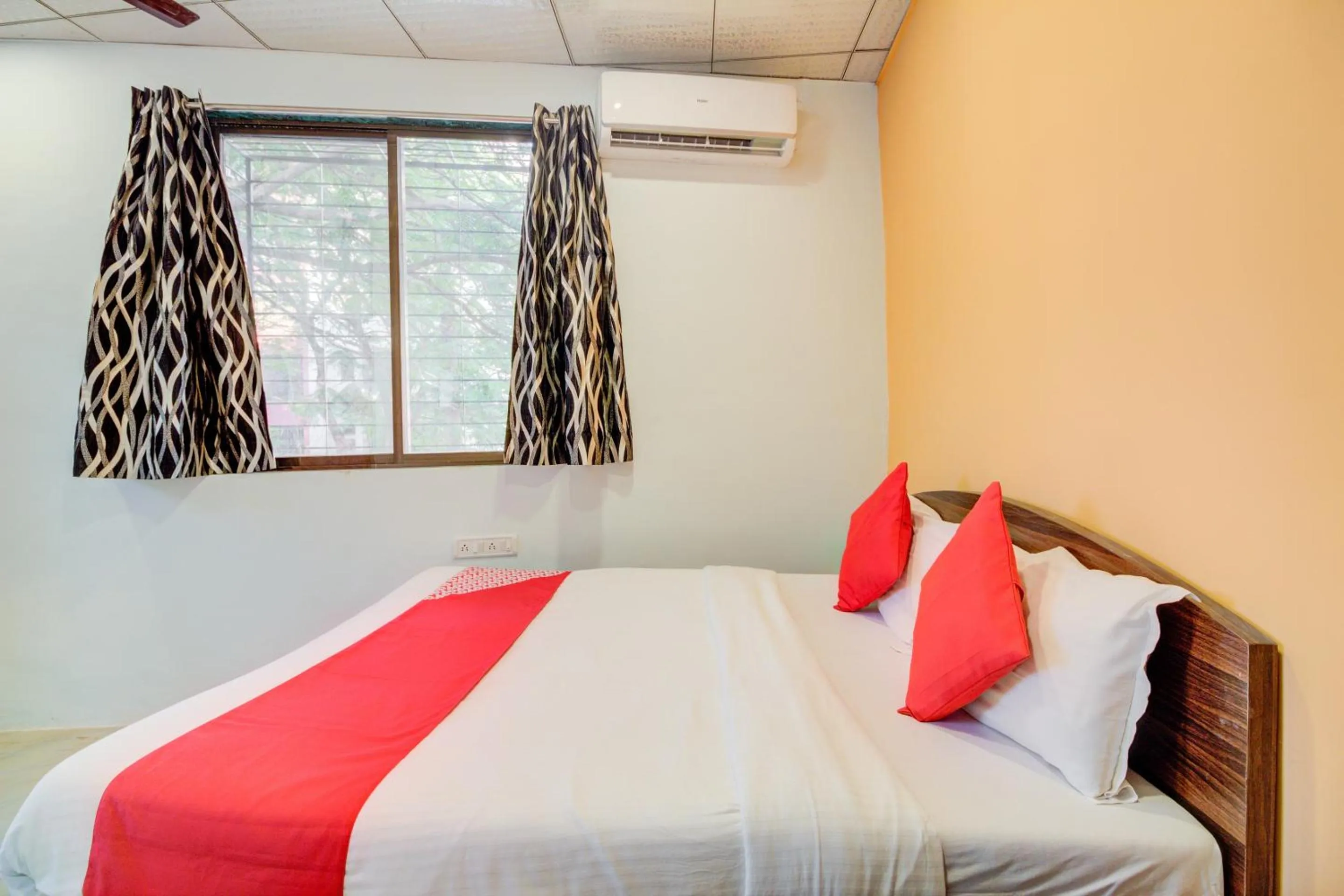 Bedroom, Bed in Super Hotel O Anjali Hotel