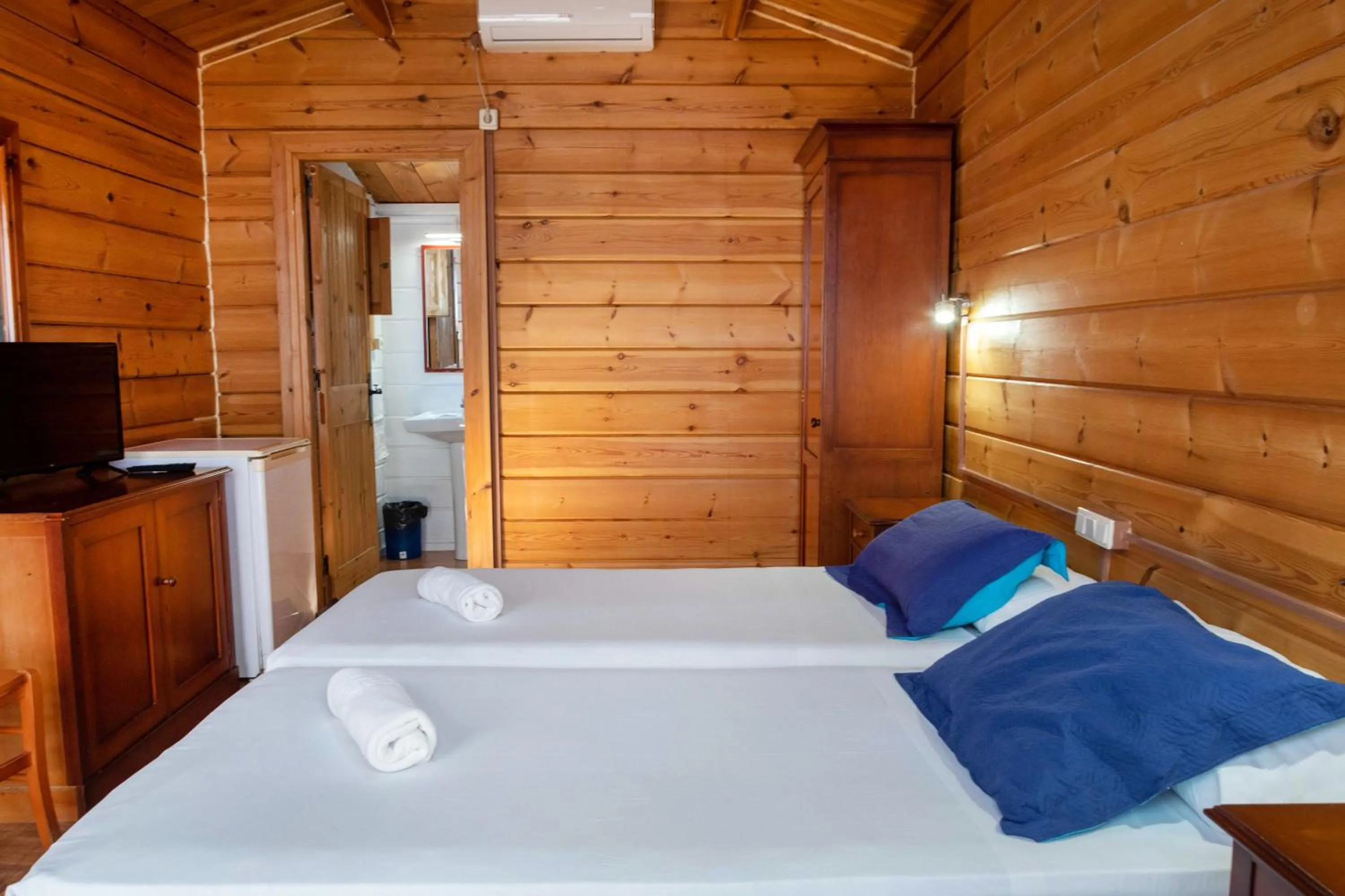 Bed in APARTAMENTOS PALASIET