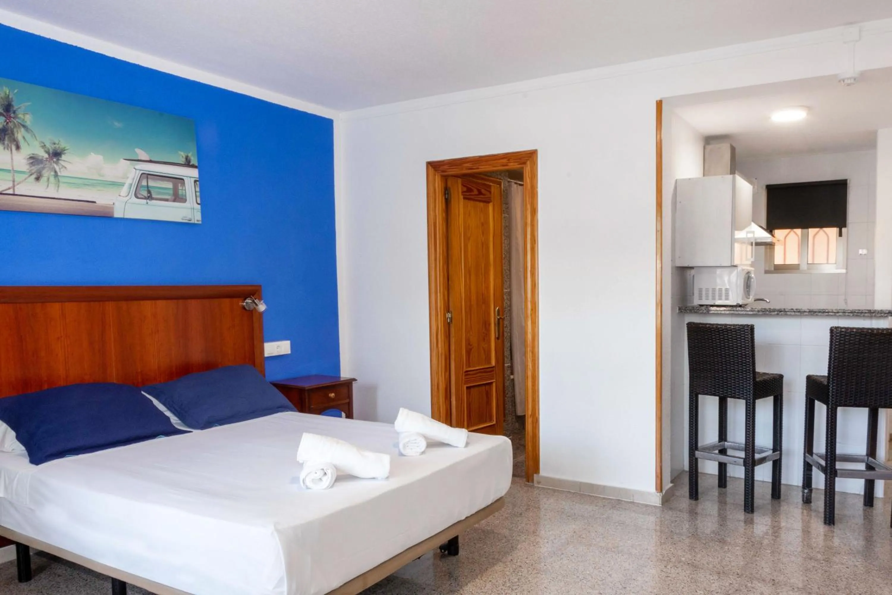 Bed in APARTAMENTOS PALASIET