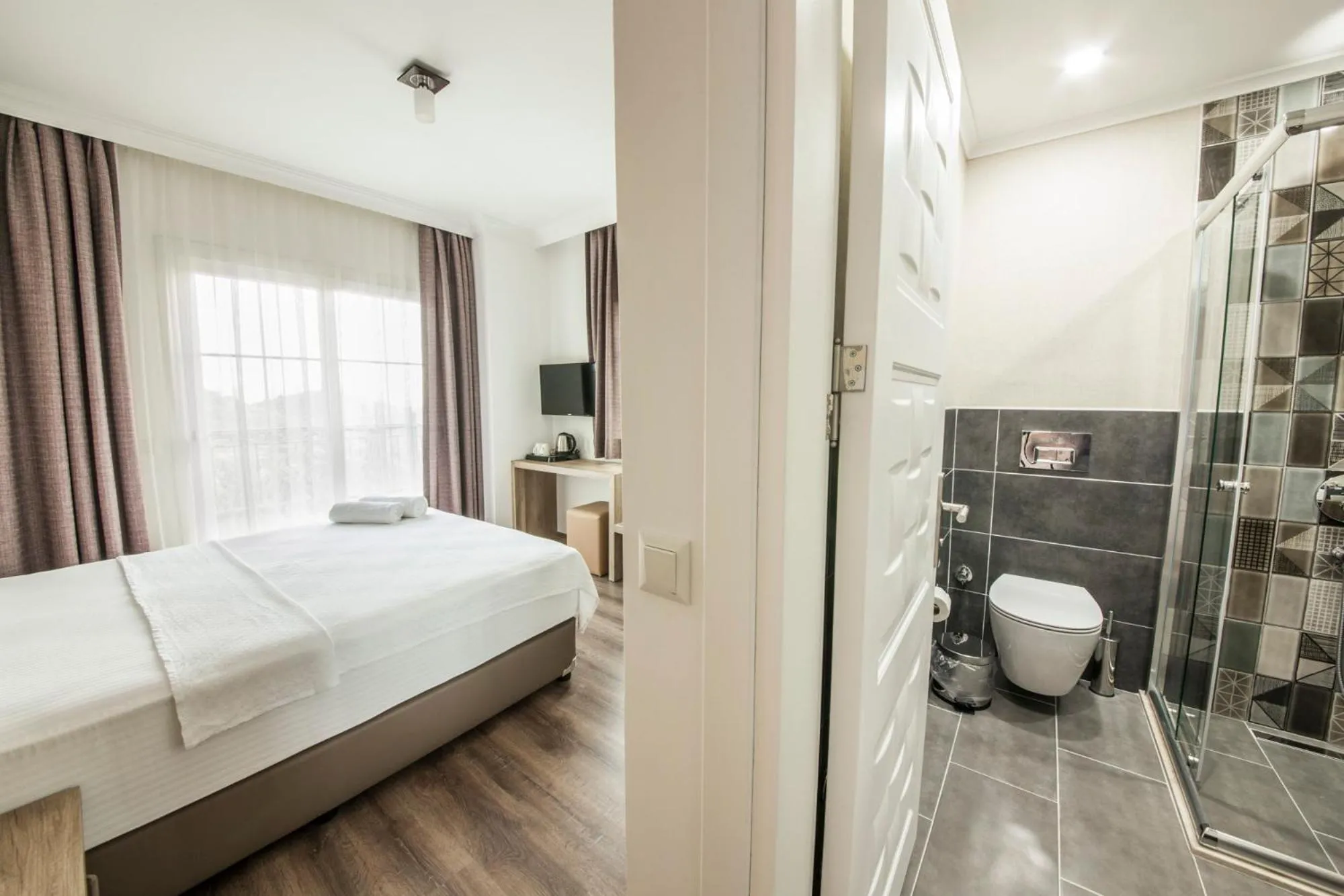 Toilet, Bed in dekatria rooms&aparts