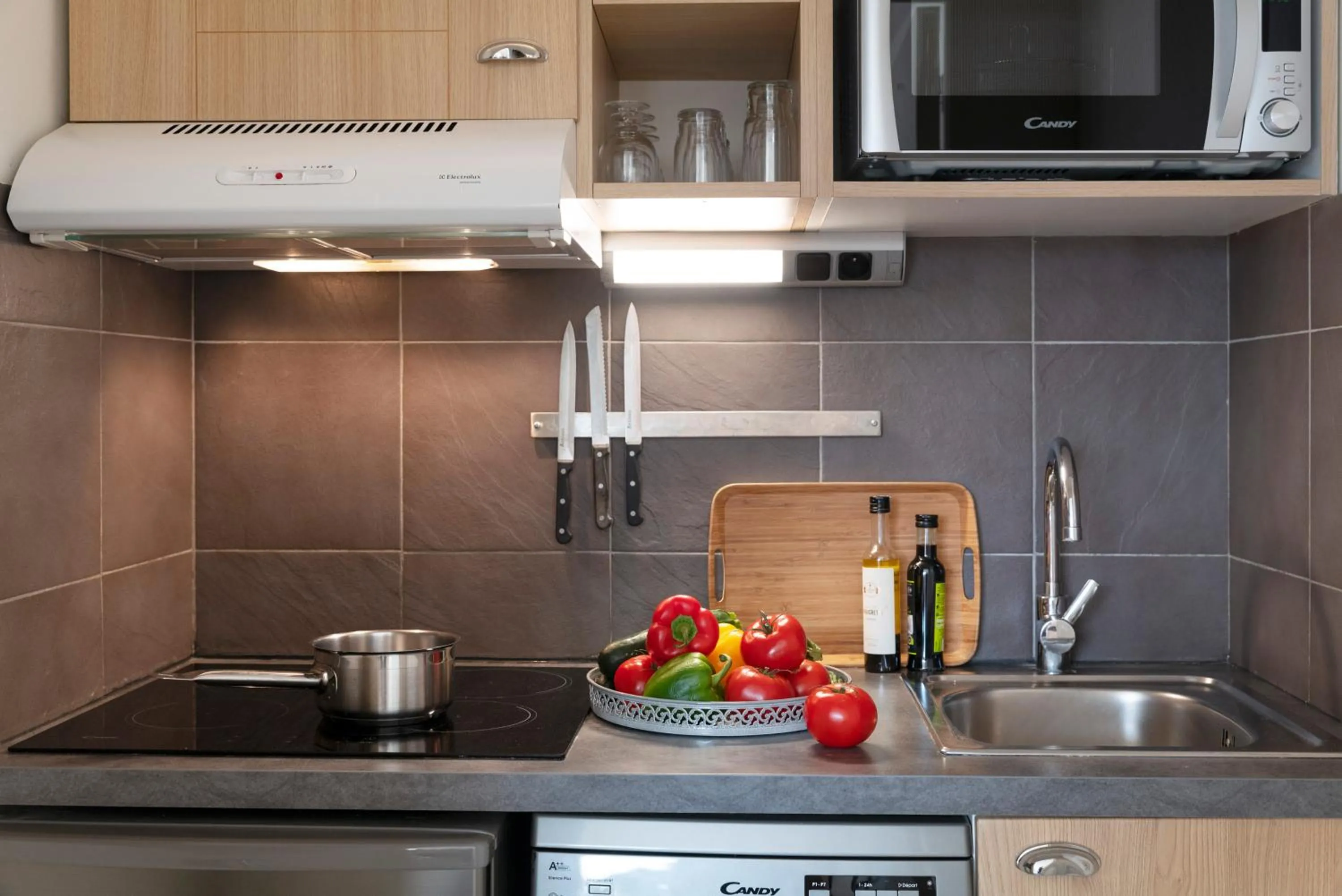 Kitchen or kitchenette in Résidence Pierre & Vacances Premium Le Domaine de Cramphore