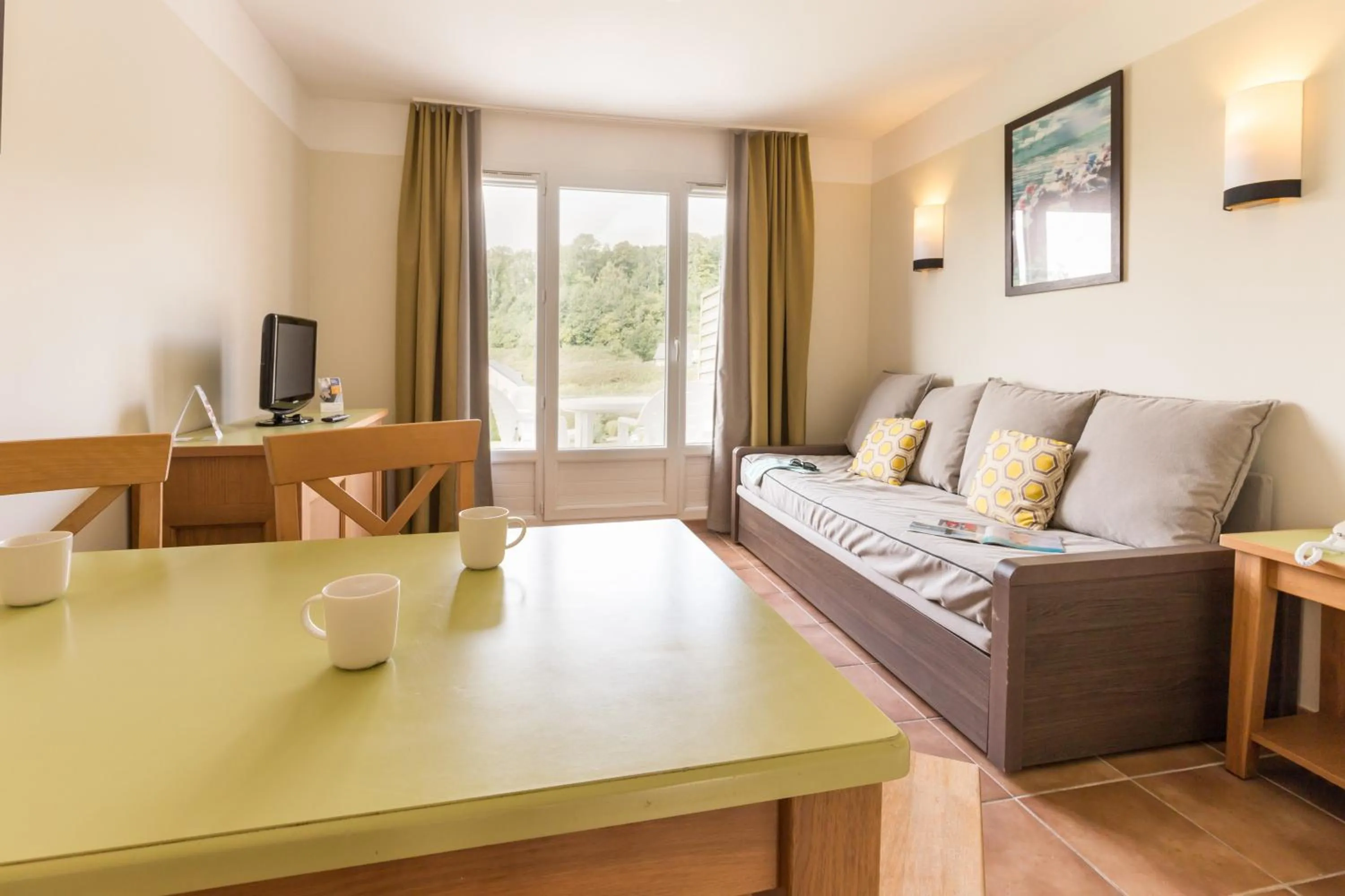 TV and multimedia in Village Pierre & Vacances Normandy Garden