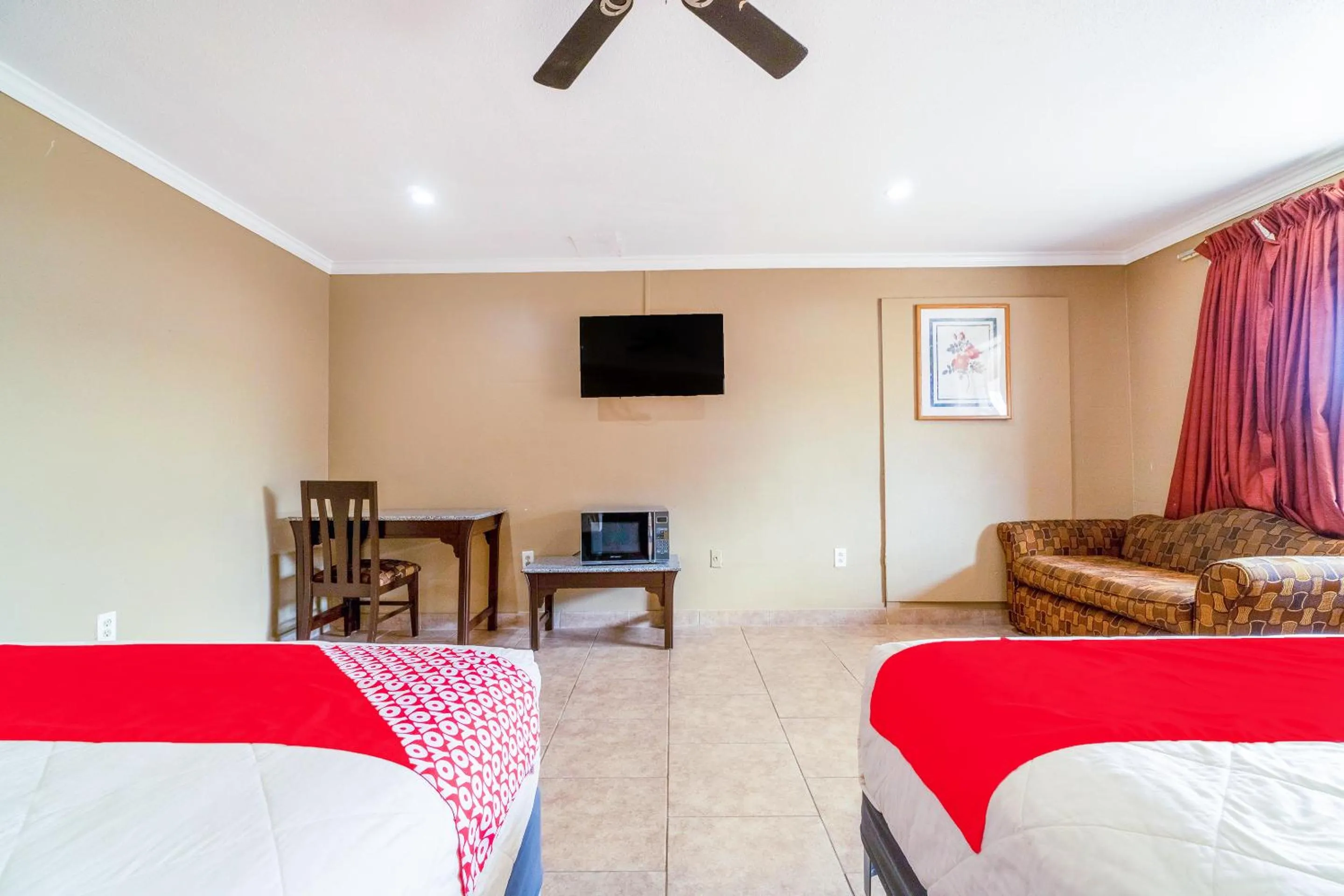 Bedroom in Capital O Hotel Beeville -US 181