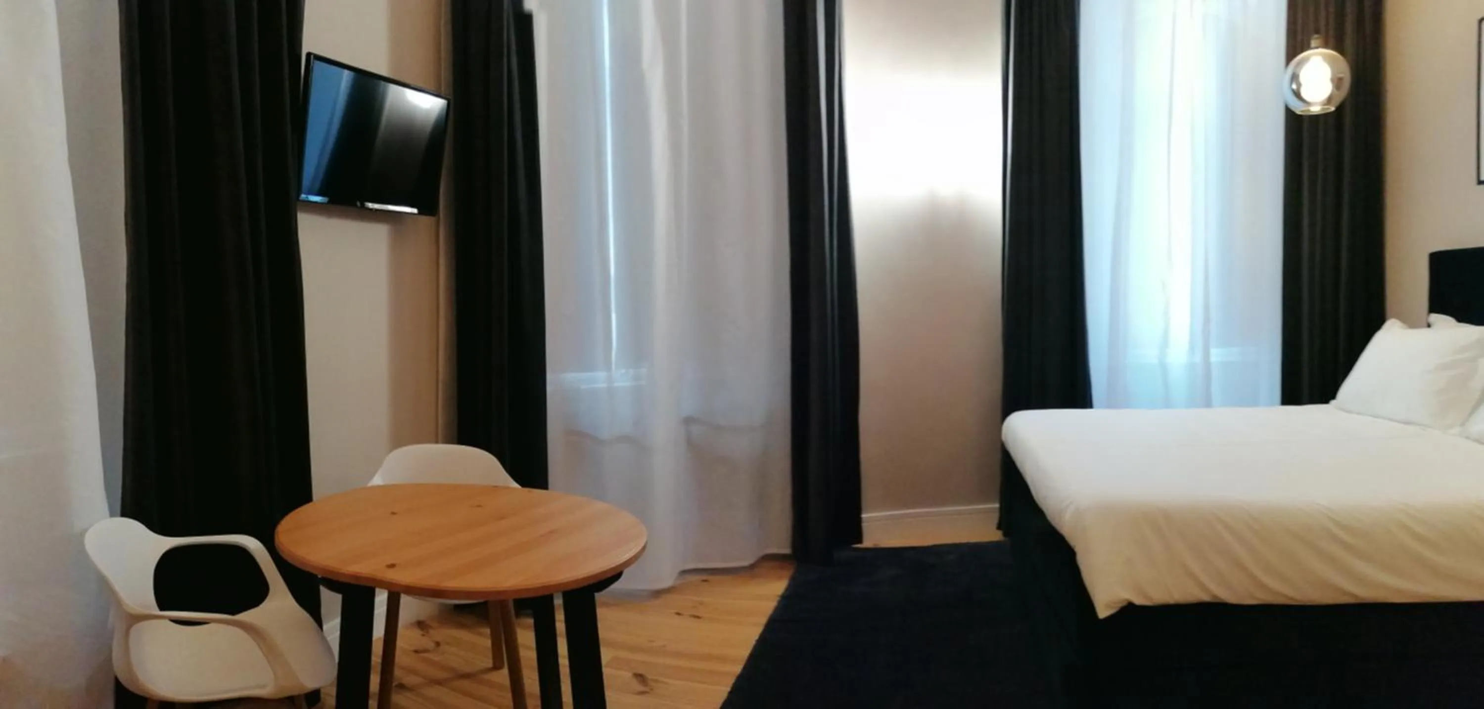 Bed in Temple Suites Guesthouse