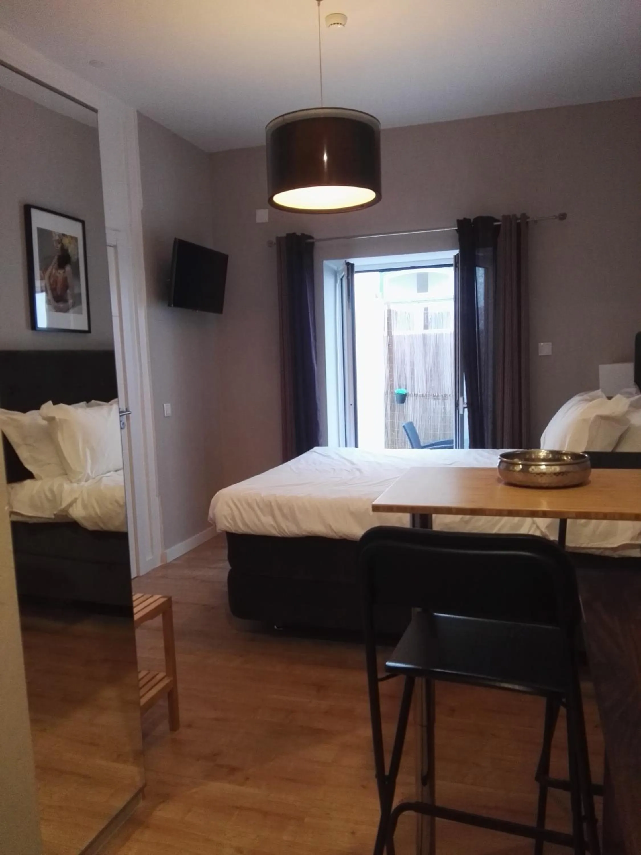 Bed in Temple Suites Guesthouse