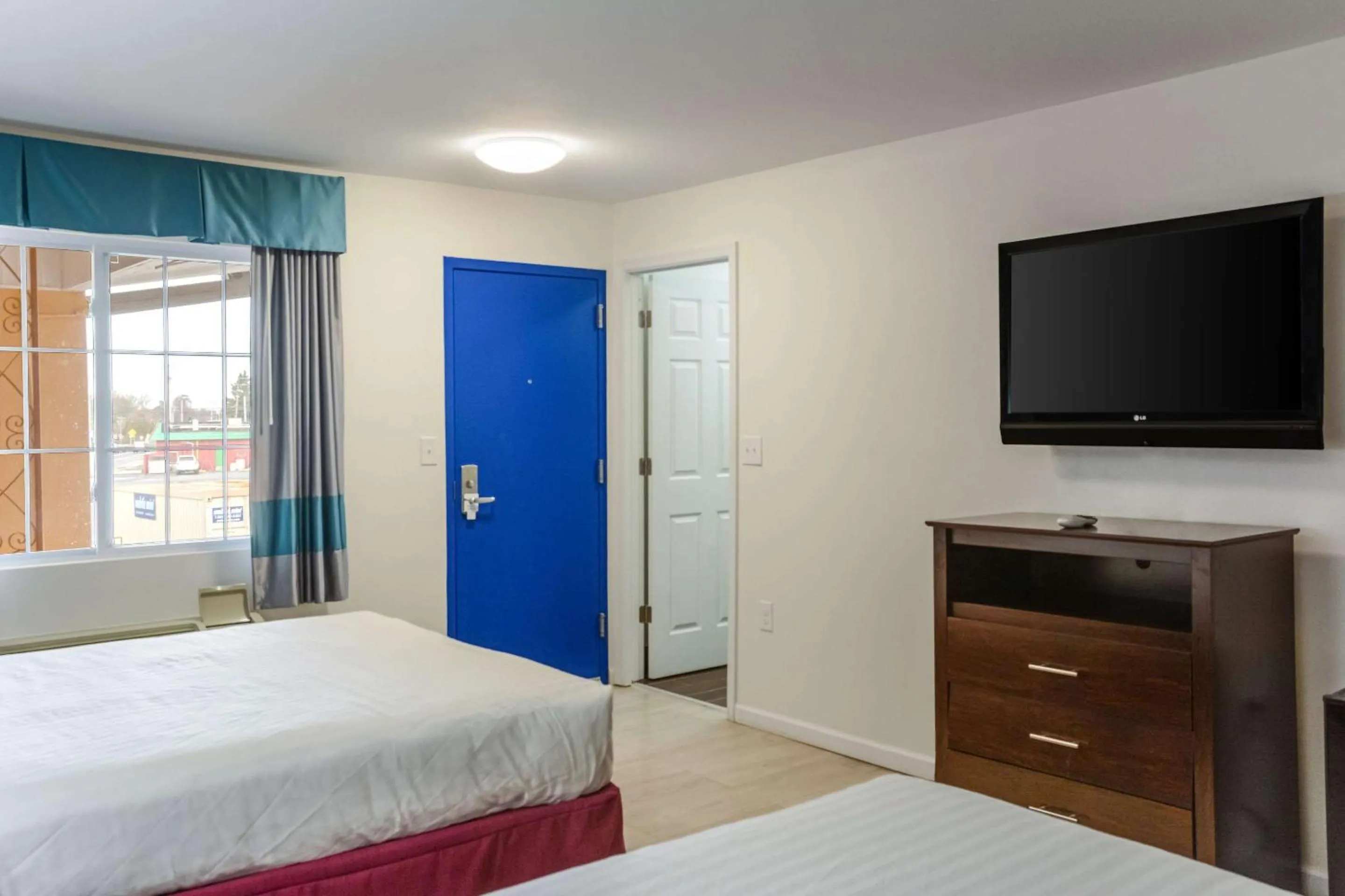 Bedroom, Bed in Rodeway Inn Milford
