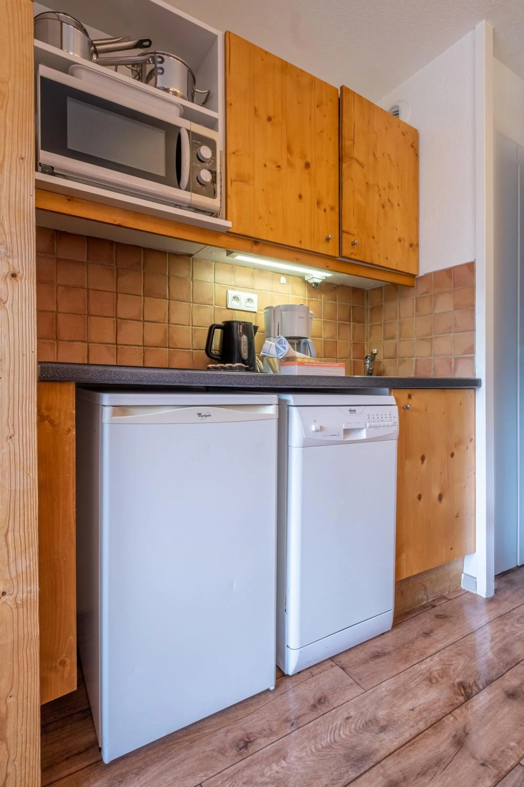 Kitchen or kitchenette in Résidence Pierre & Vacances Les Sentiers du Tueda