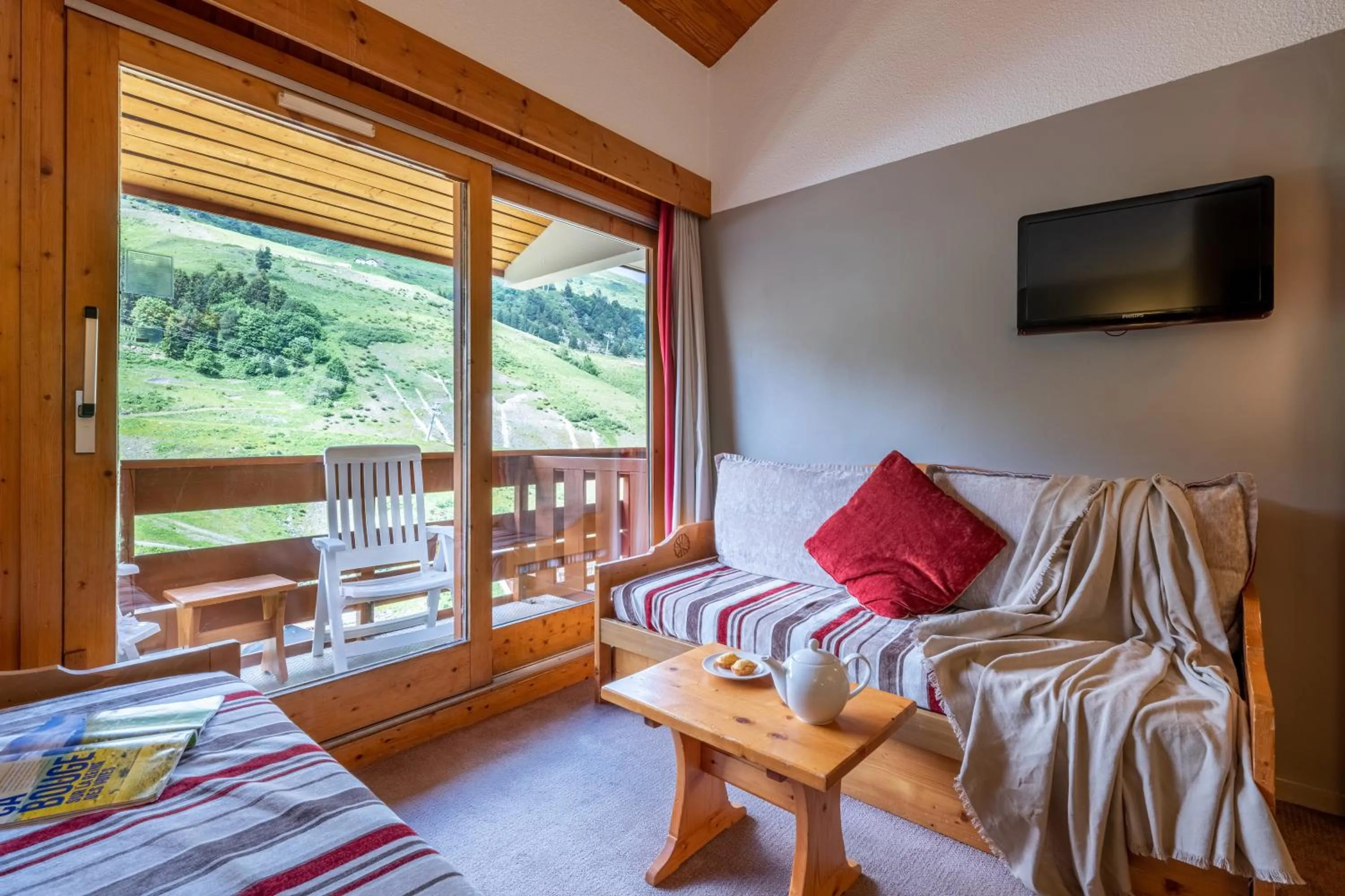 Seating area, Bed in Résidence Pierre & Vacances Les Sentiers du Tueda