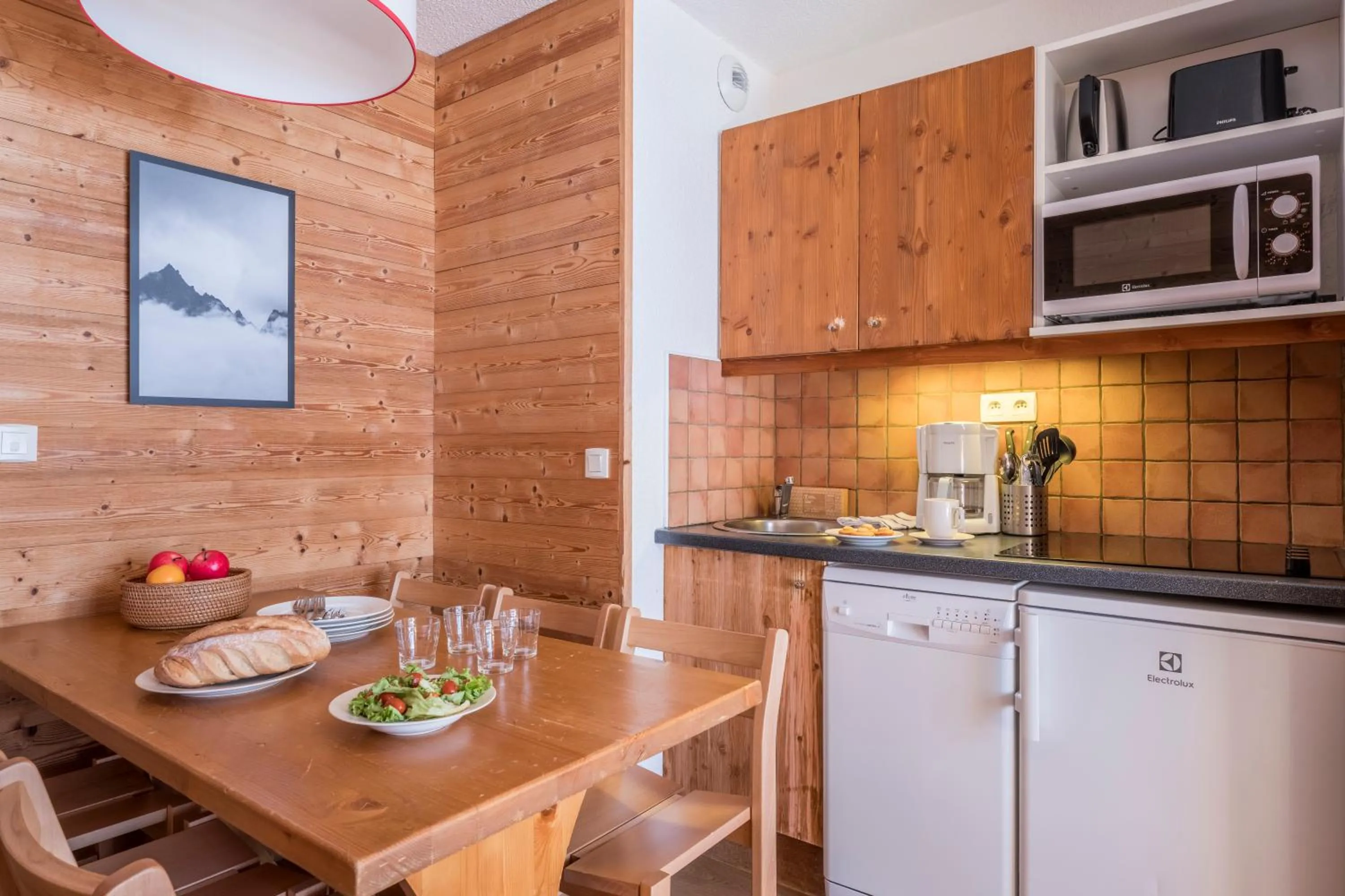 Kitchen or kitchenette in Résidence Pierre & Vacances Les Sentiers du Tueda