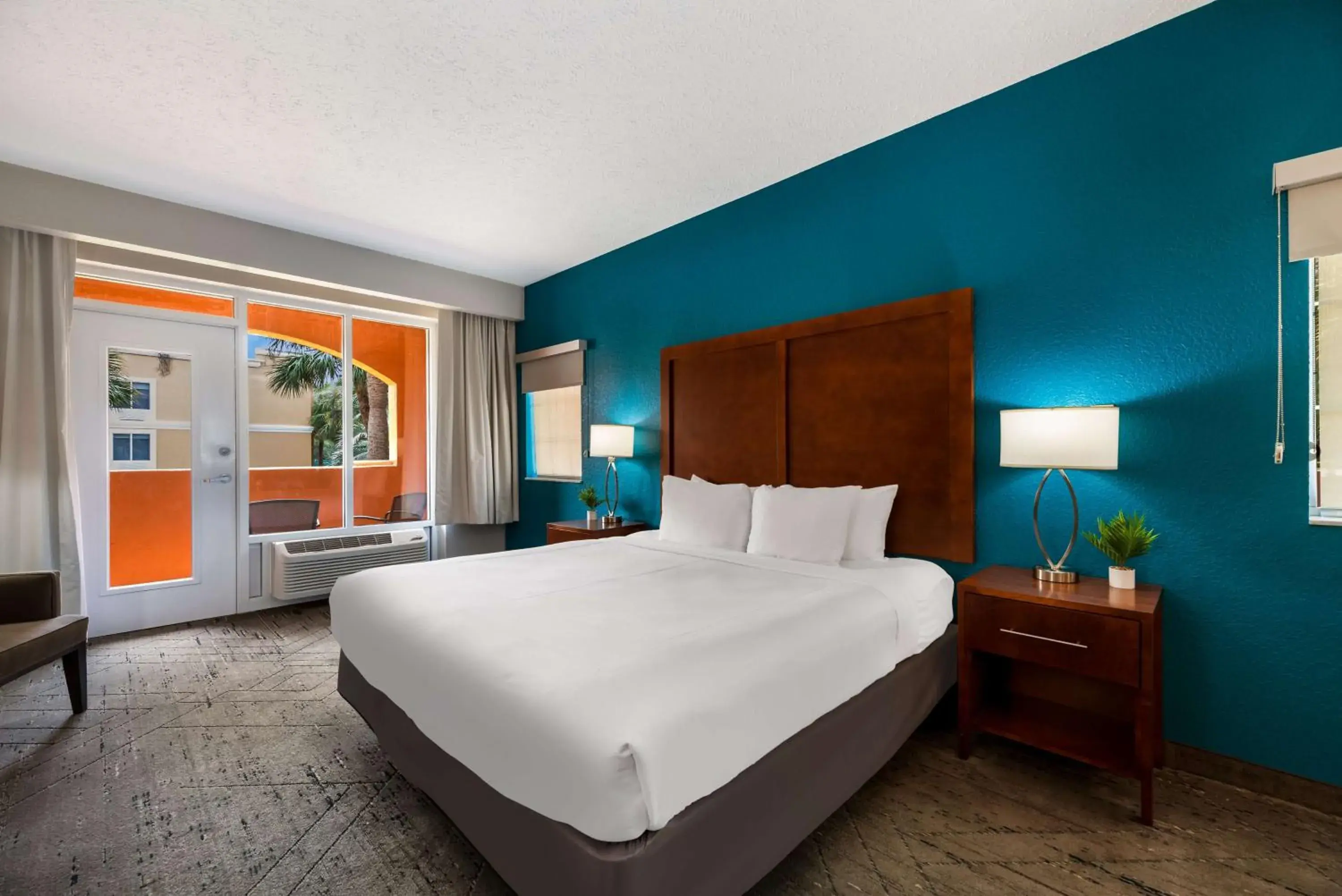 King Room with Balcony in SureStay Plus Hotel by Best Western The Villages King Room with Balcony in SureStay Plus Hotel by Best Western The Villages