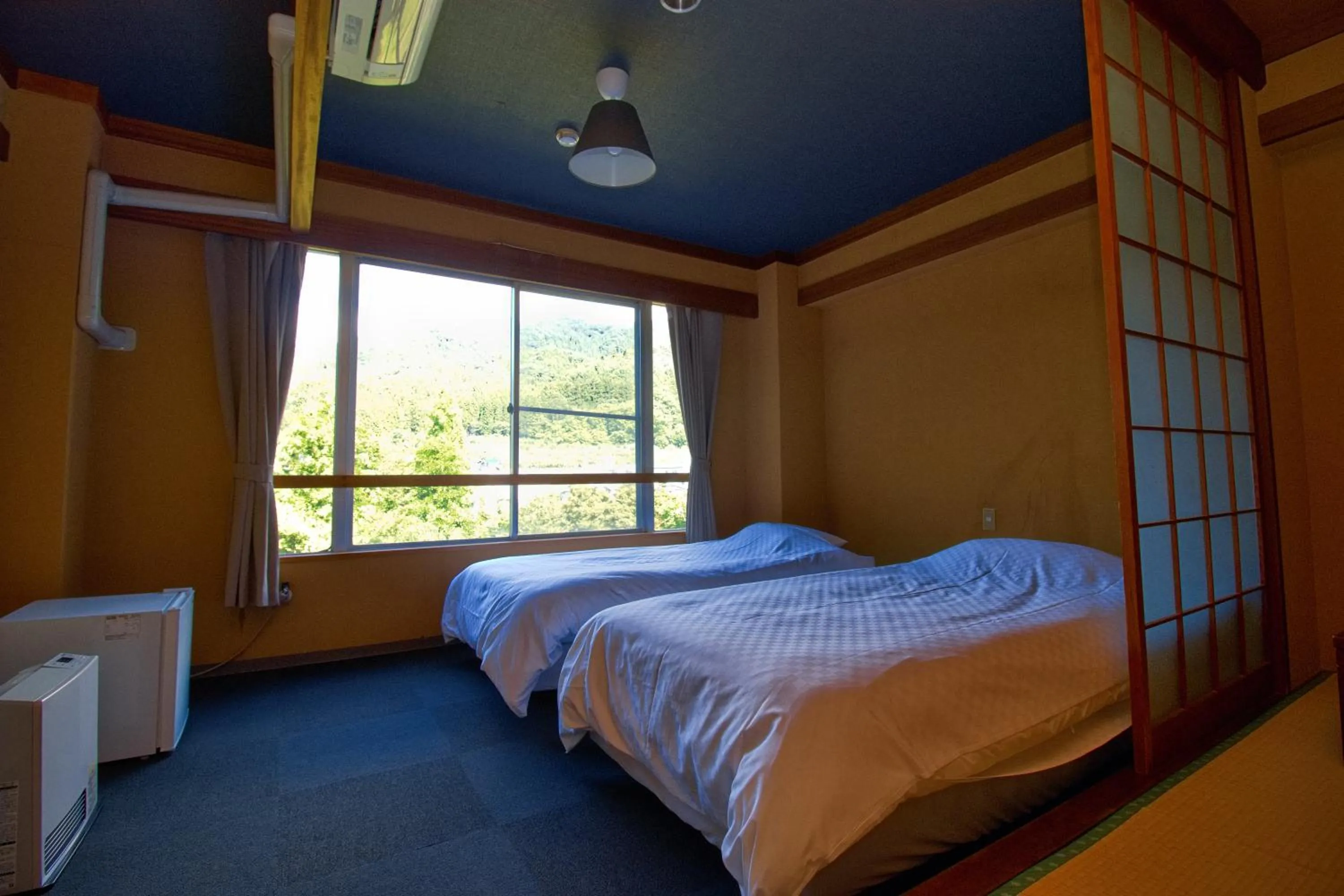 Bed in Hotel&Resort Yamanouchi Hills
