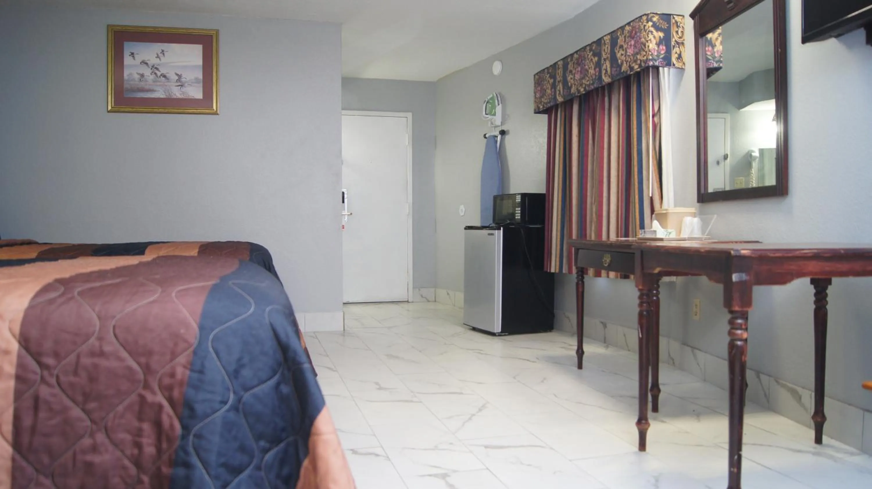 Bedroom in Holiday Lodge & Suites