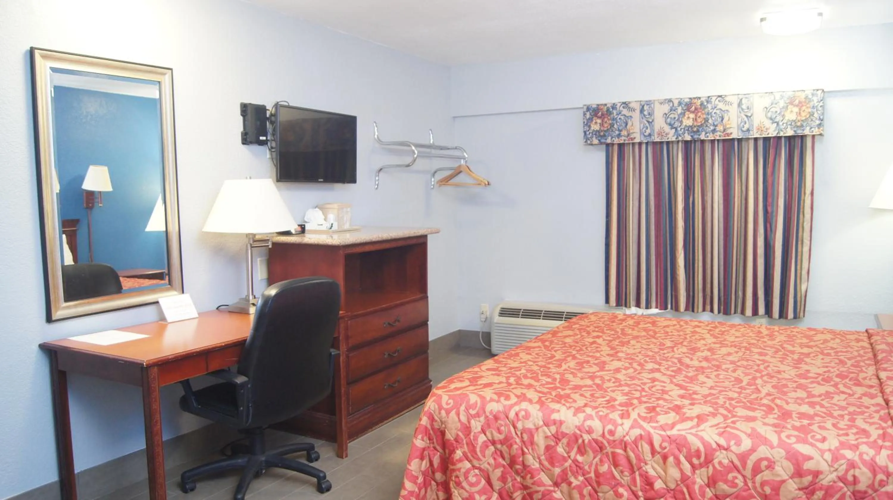 Bedroom in Holiday Lodge & Suites